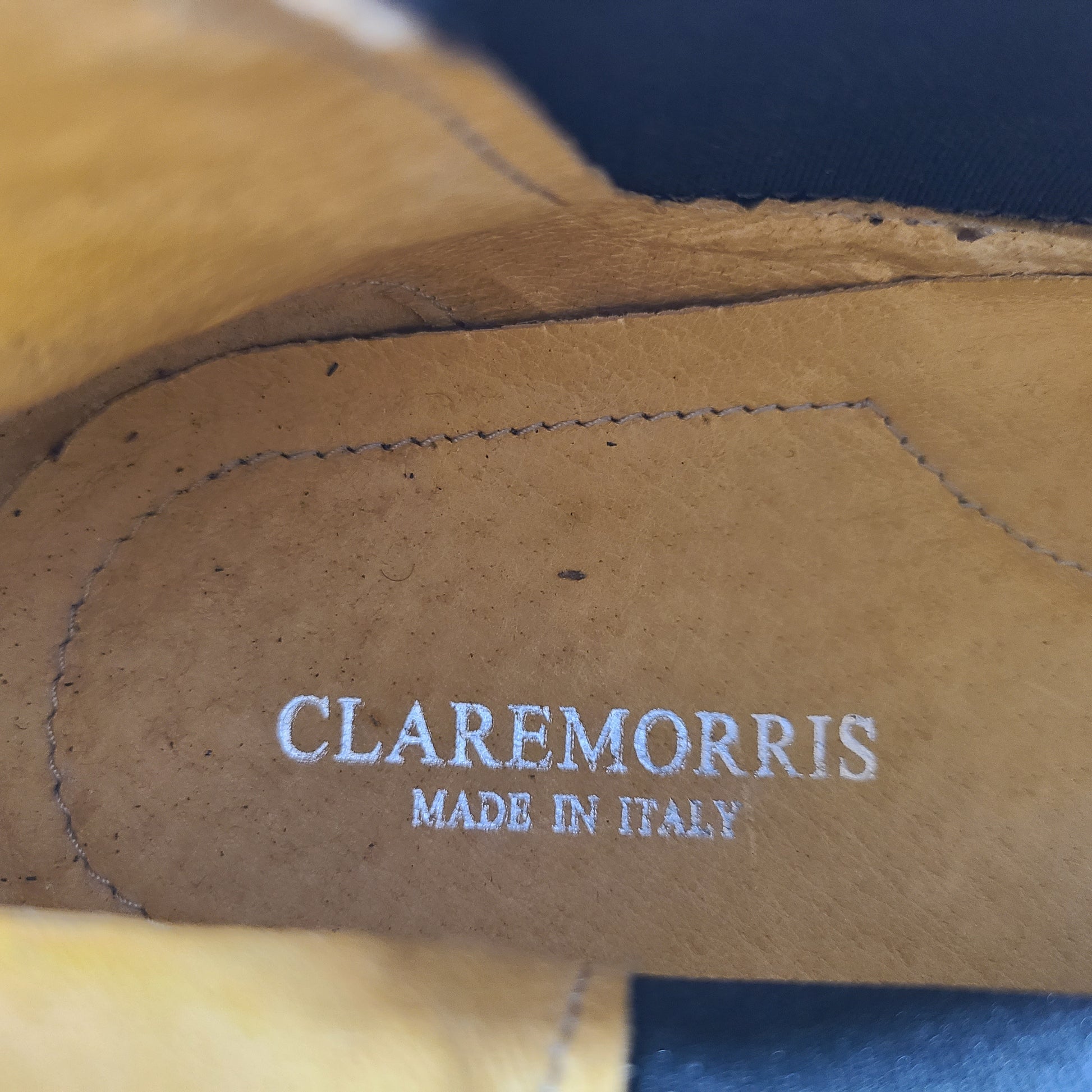 A pair of black leather Chelsea boots for men, size 44.
