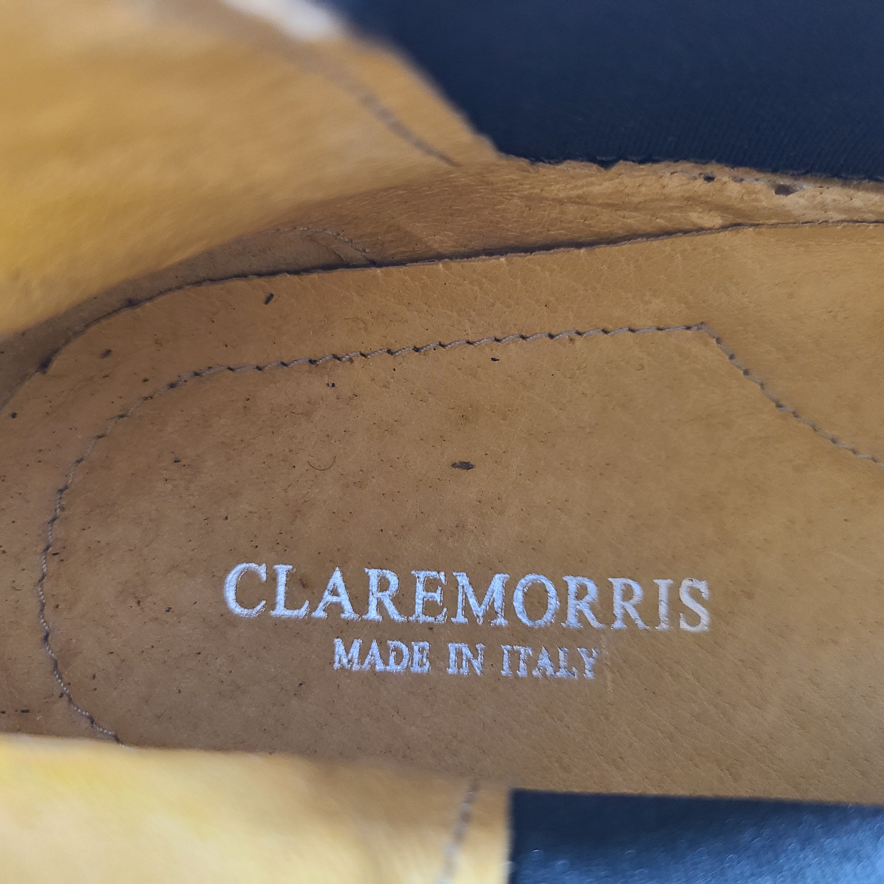 A pair of black leather Chelsea boots for men, size 44.