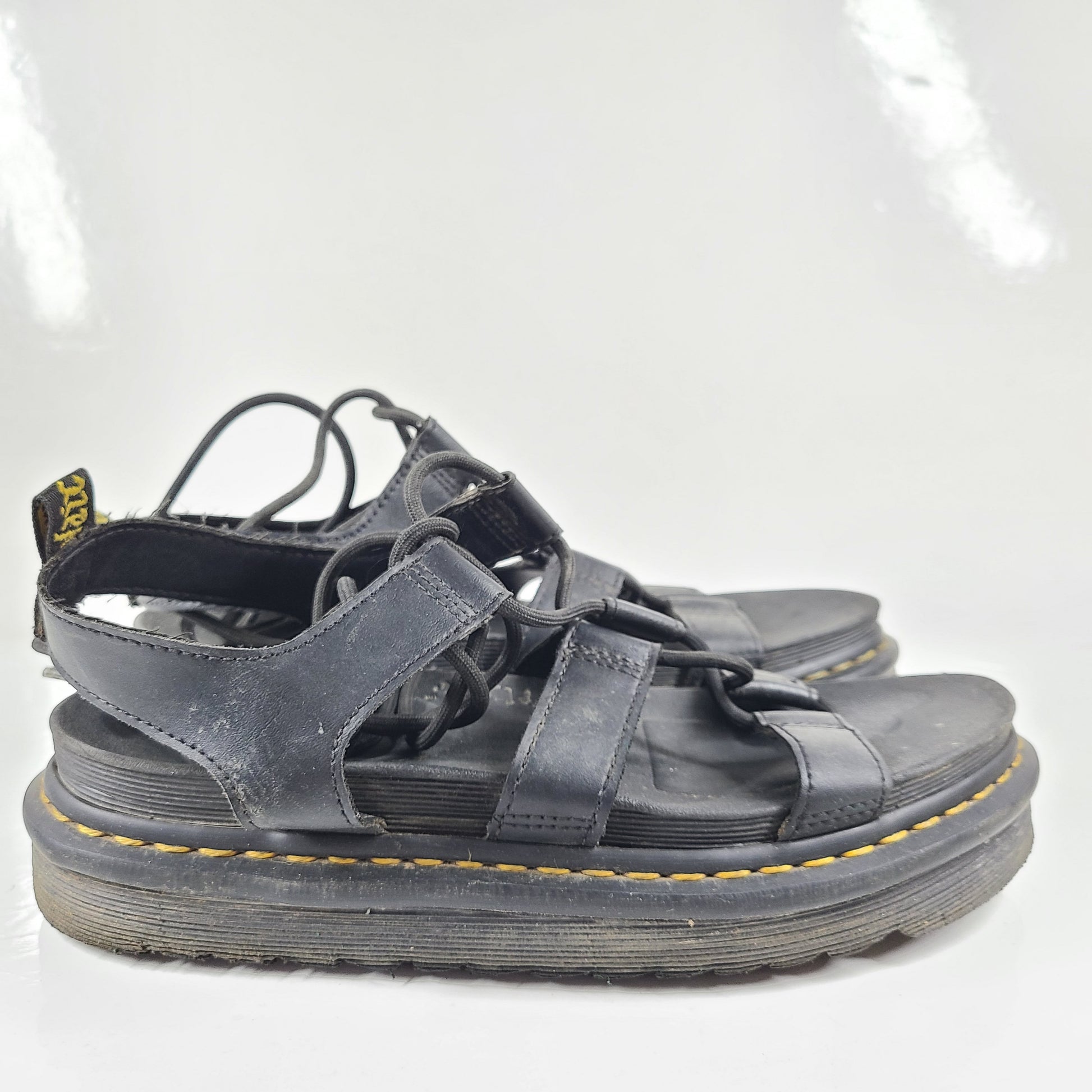 A pair of black Dr. Martens Nartilla sandals.