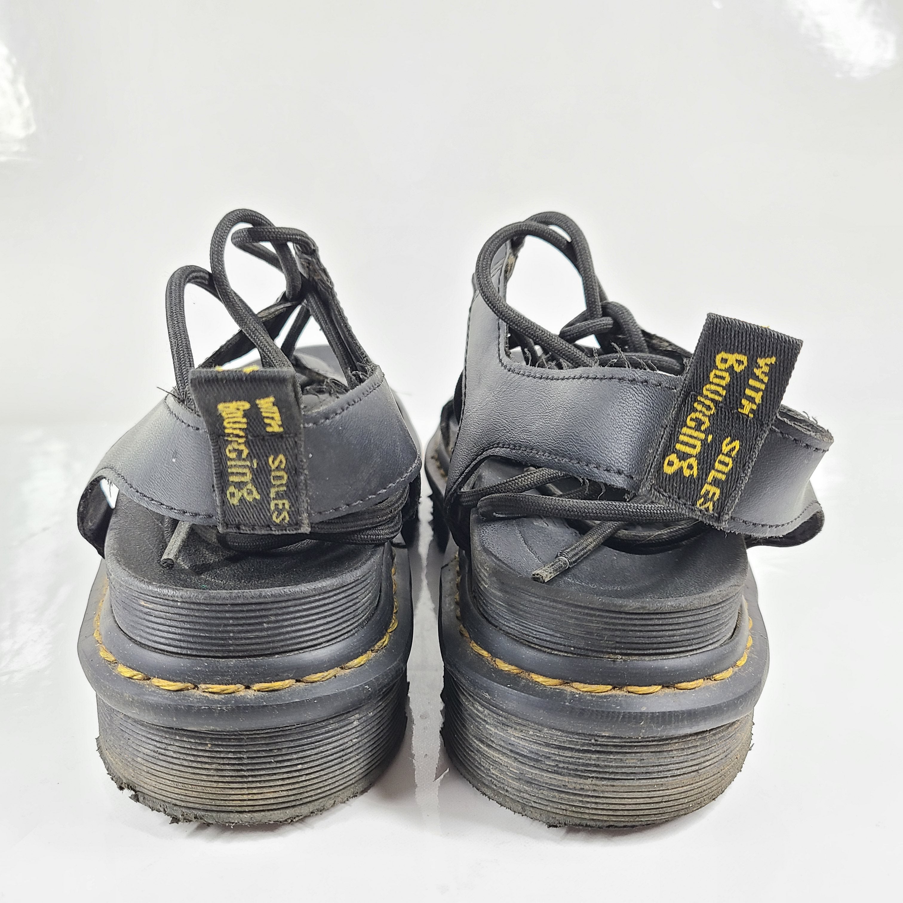 A pair of black Dr. Martens Nartilla sandals.