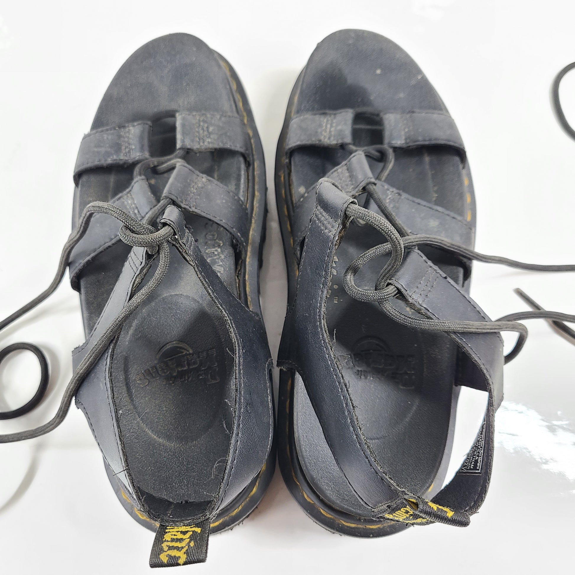 A pair of black Dr. Martens Nartilla sandals.