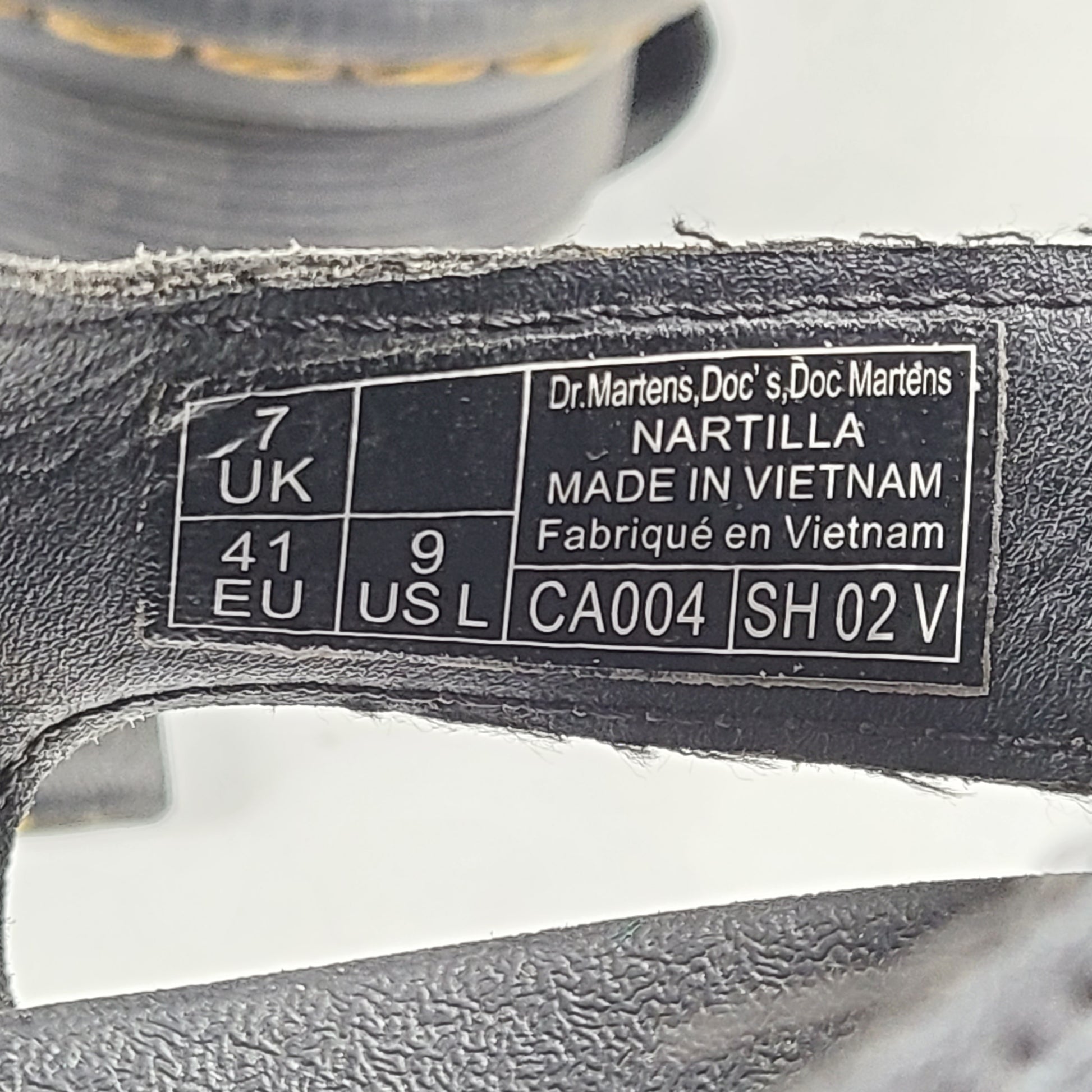 A pair of black Dr. Martens Nartilla sandals.