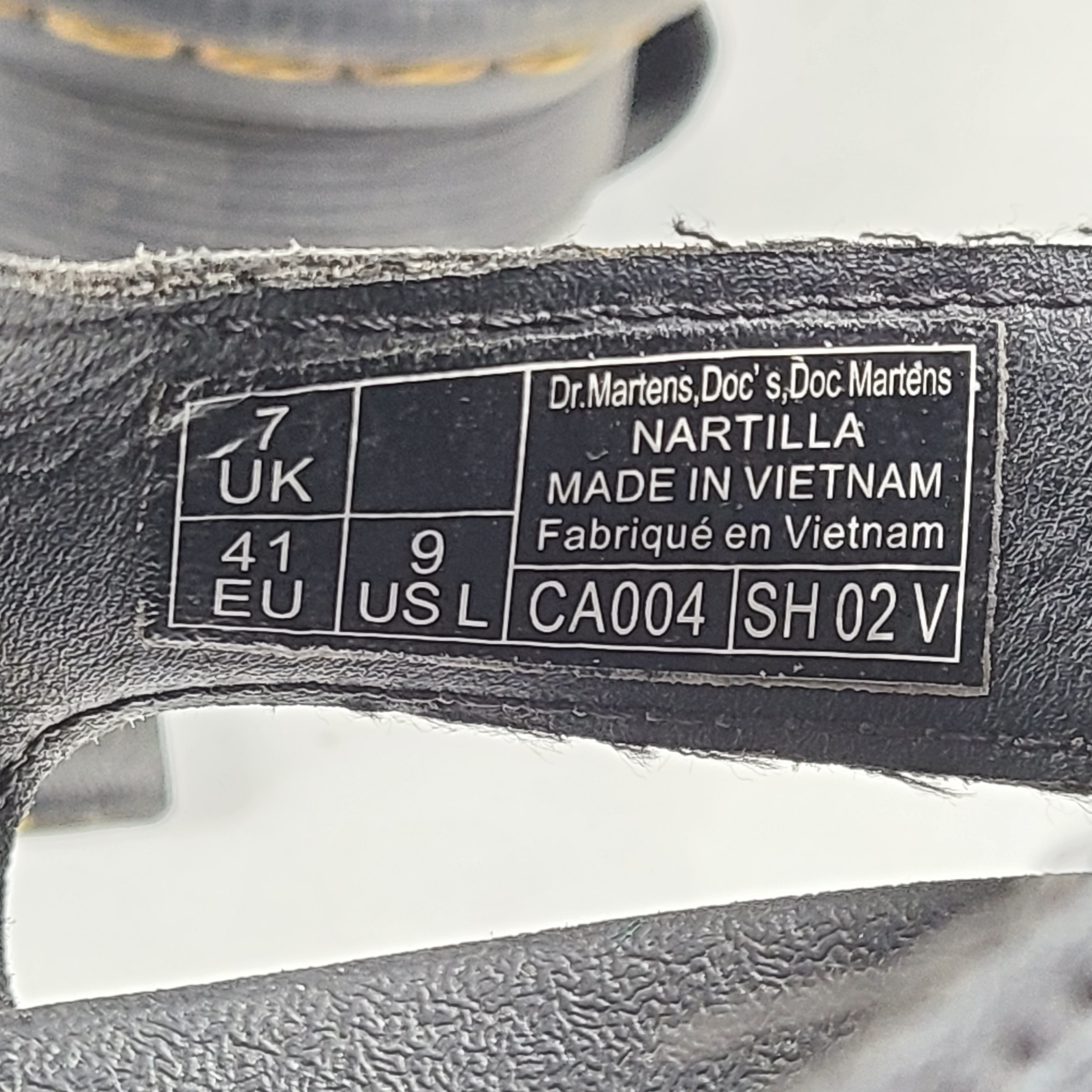 A pair of black Dr. Martens Nartilla sandals.