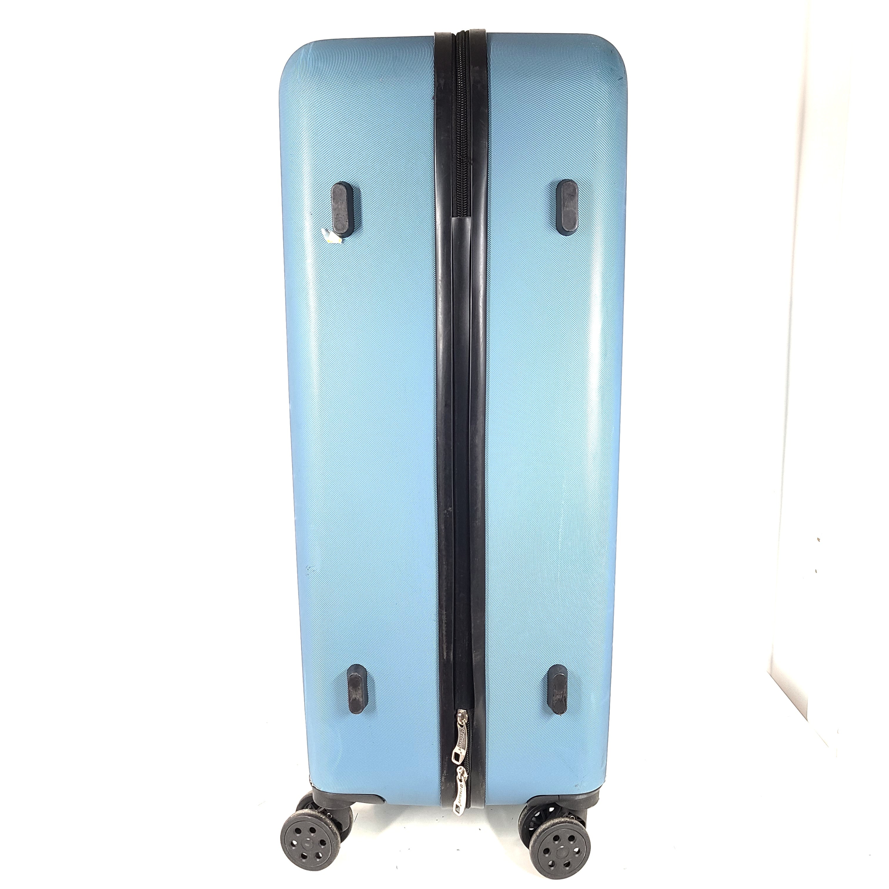 A versatile blue hard-shell suitcase with spinner wheels.