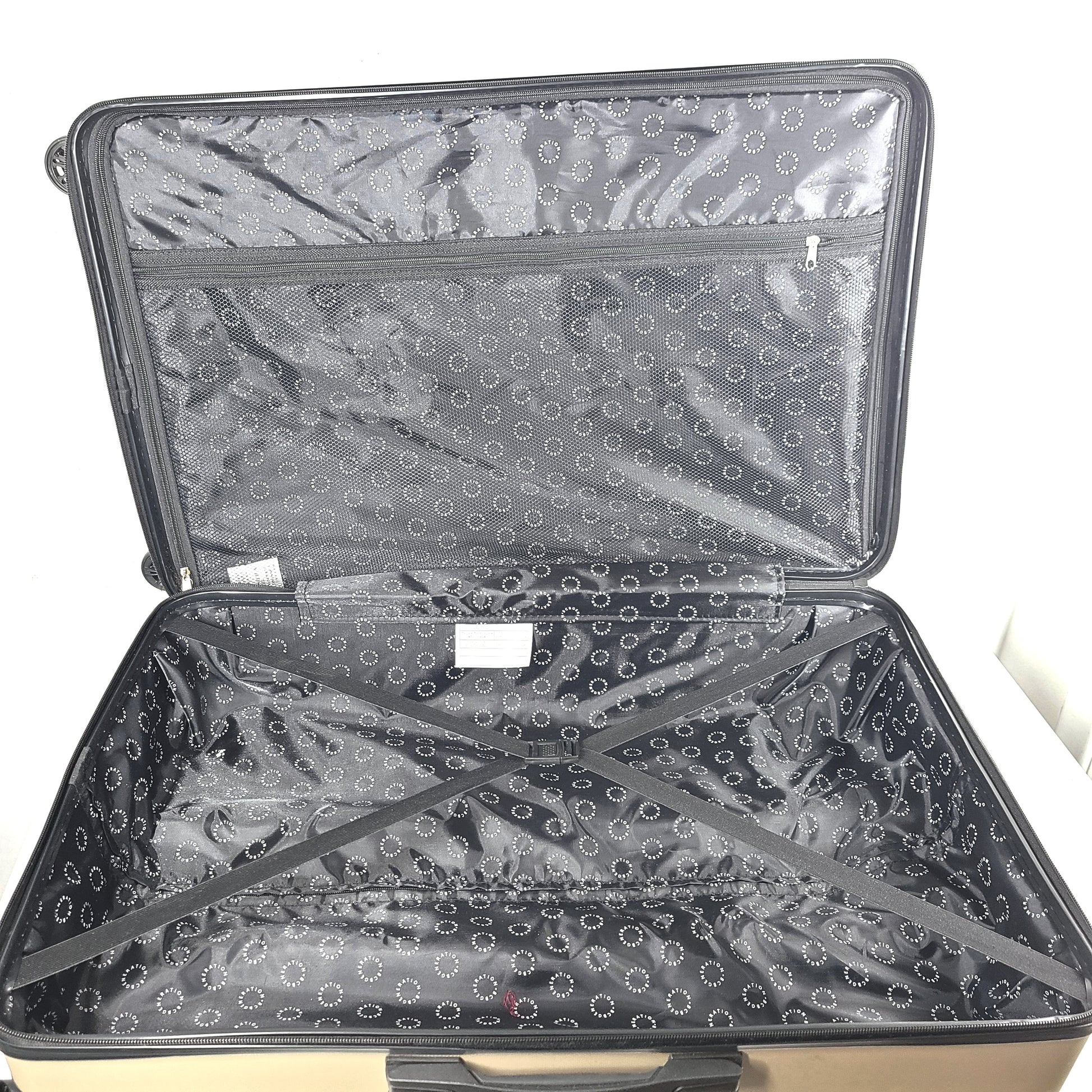A stylish gold BCBGeneration suitcase made of 100% ABS material.