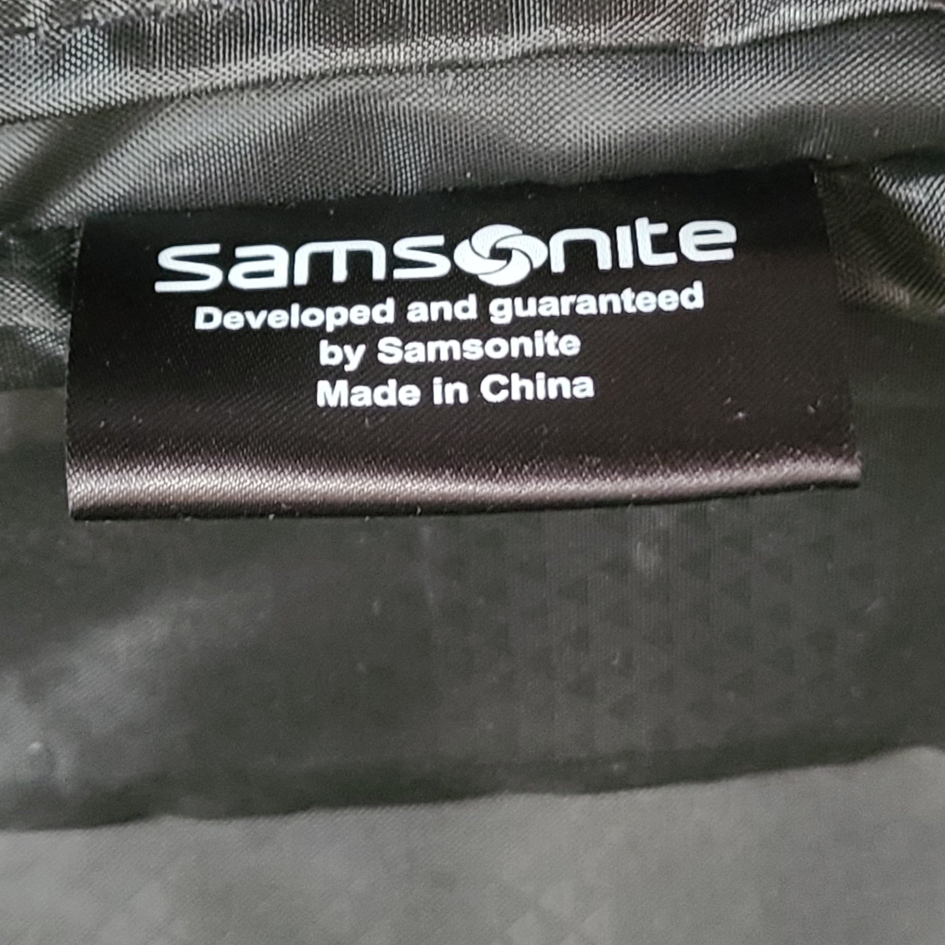 A sturdy Samsonite Spinner suitcase in black color