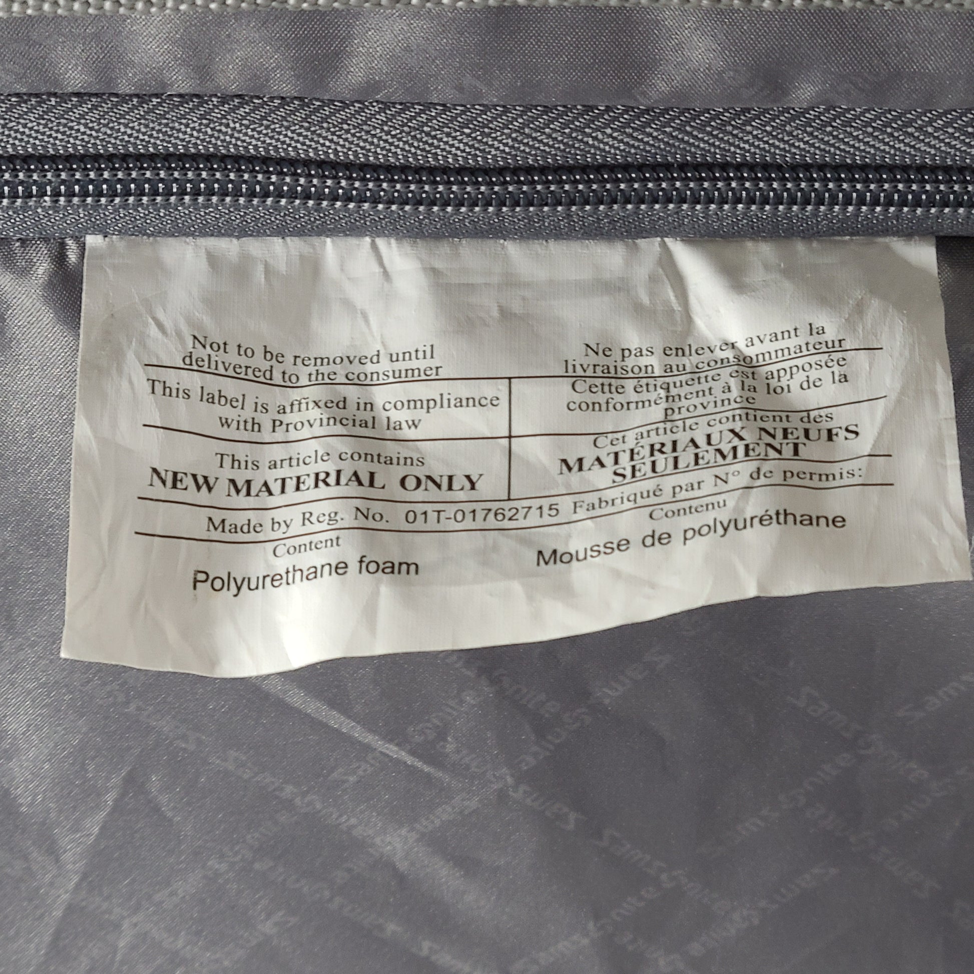 A burgundy Samsonite hardside spinner suitcase