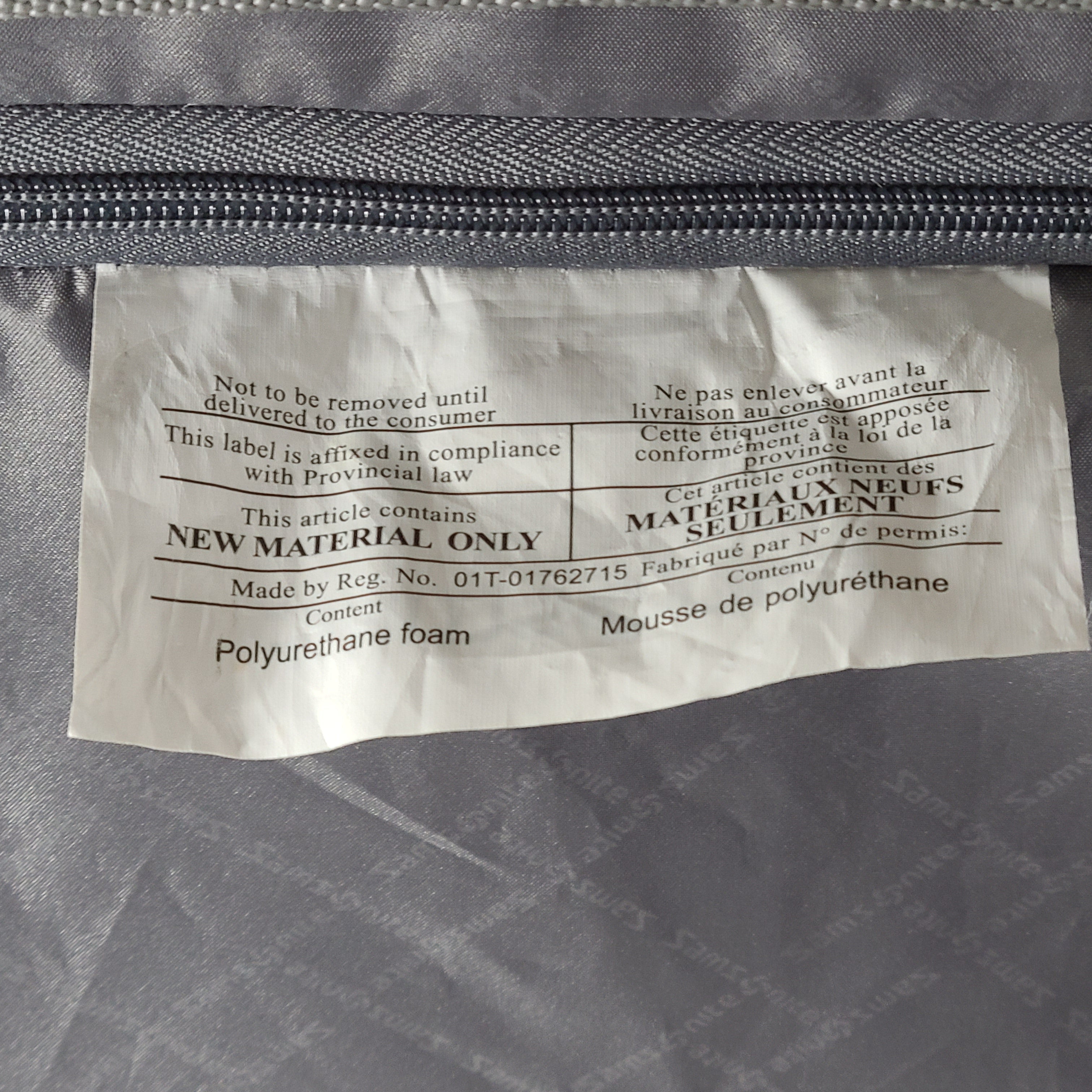 A burgundy Samsonite hardside spinner suitcase