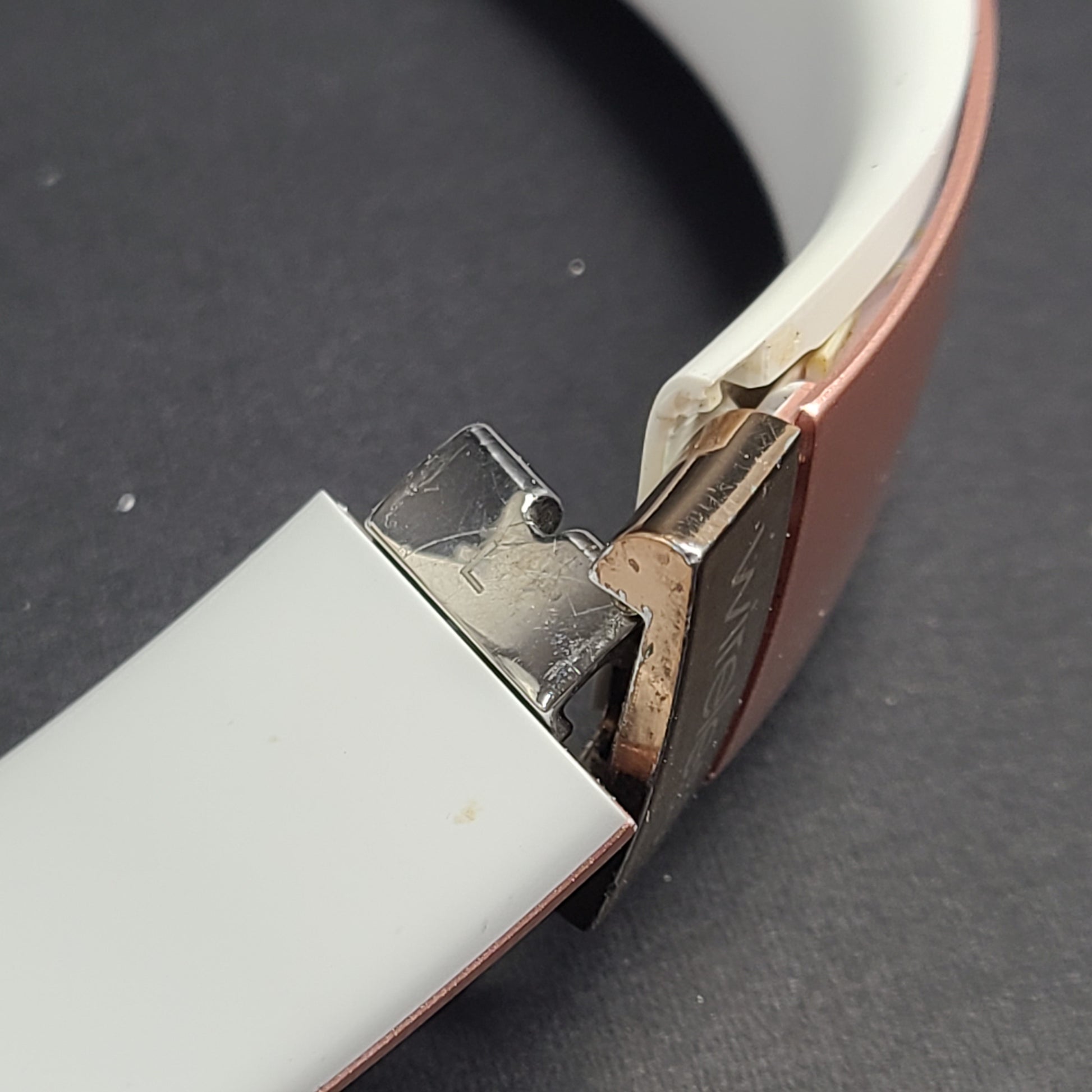 A stylish pair of rose gold wireless on-ear headphones offering premium sound and long-lasting comfort