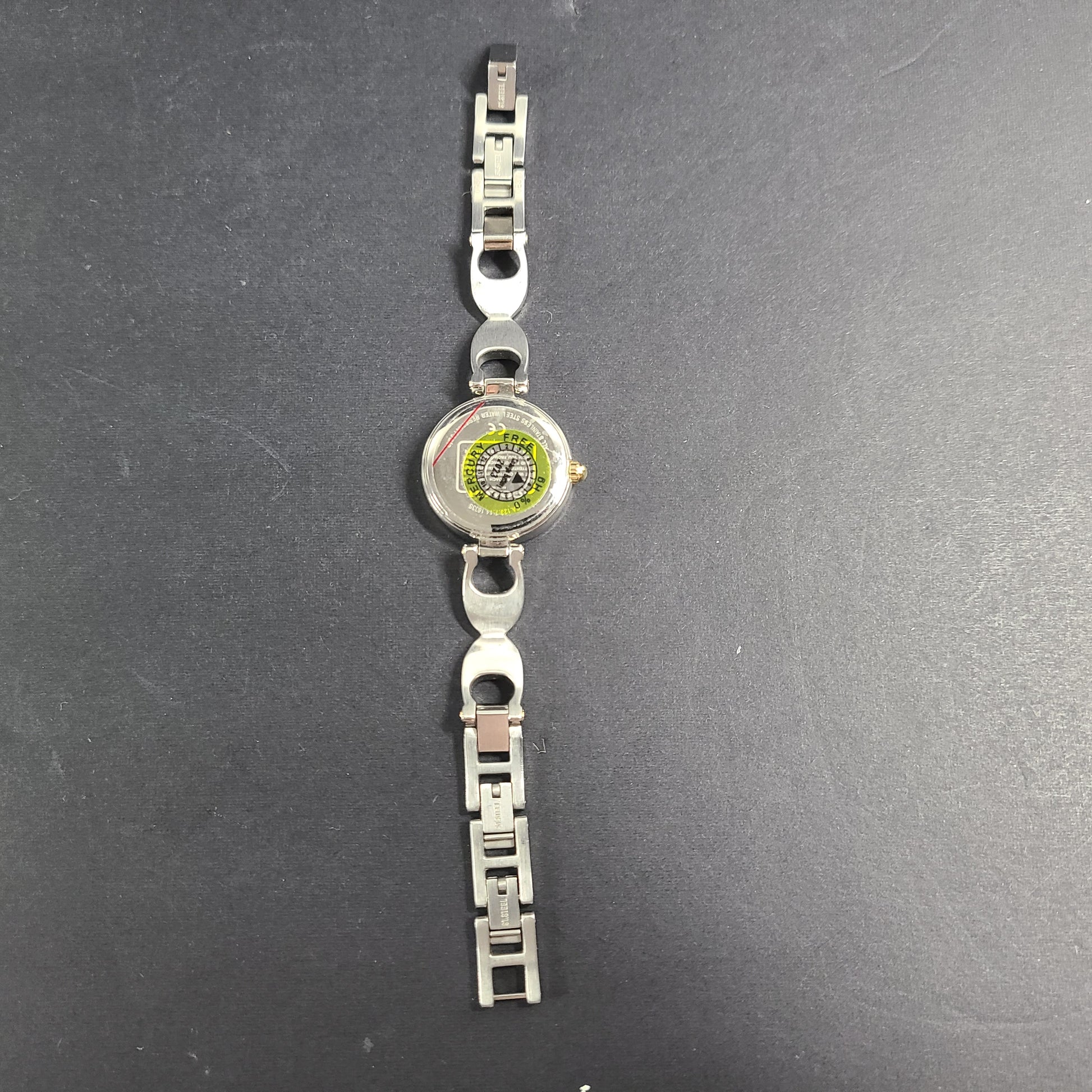 A stylish Coach women's stainless steel watch with model number 1633S.