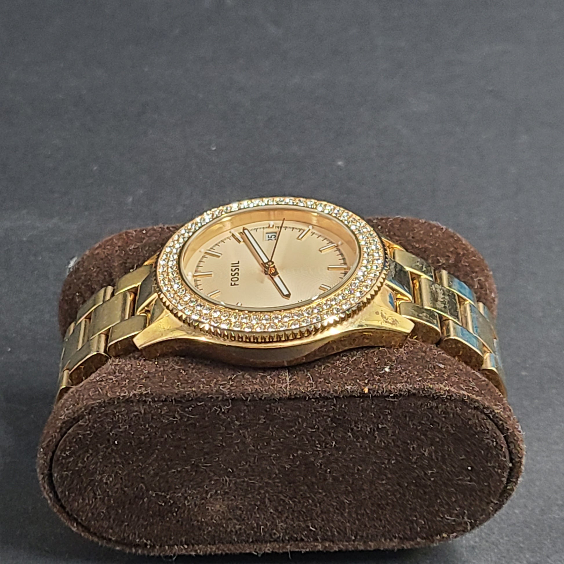 A stylish Fossil Analog Women's Watch with gold tones and crystal accents