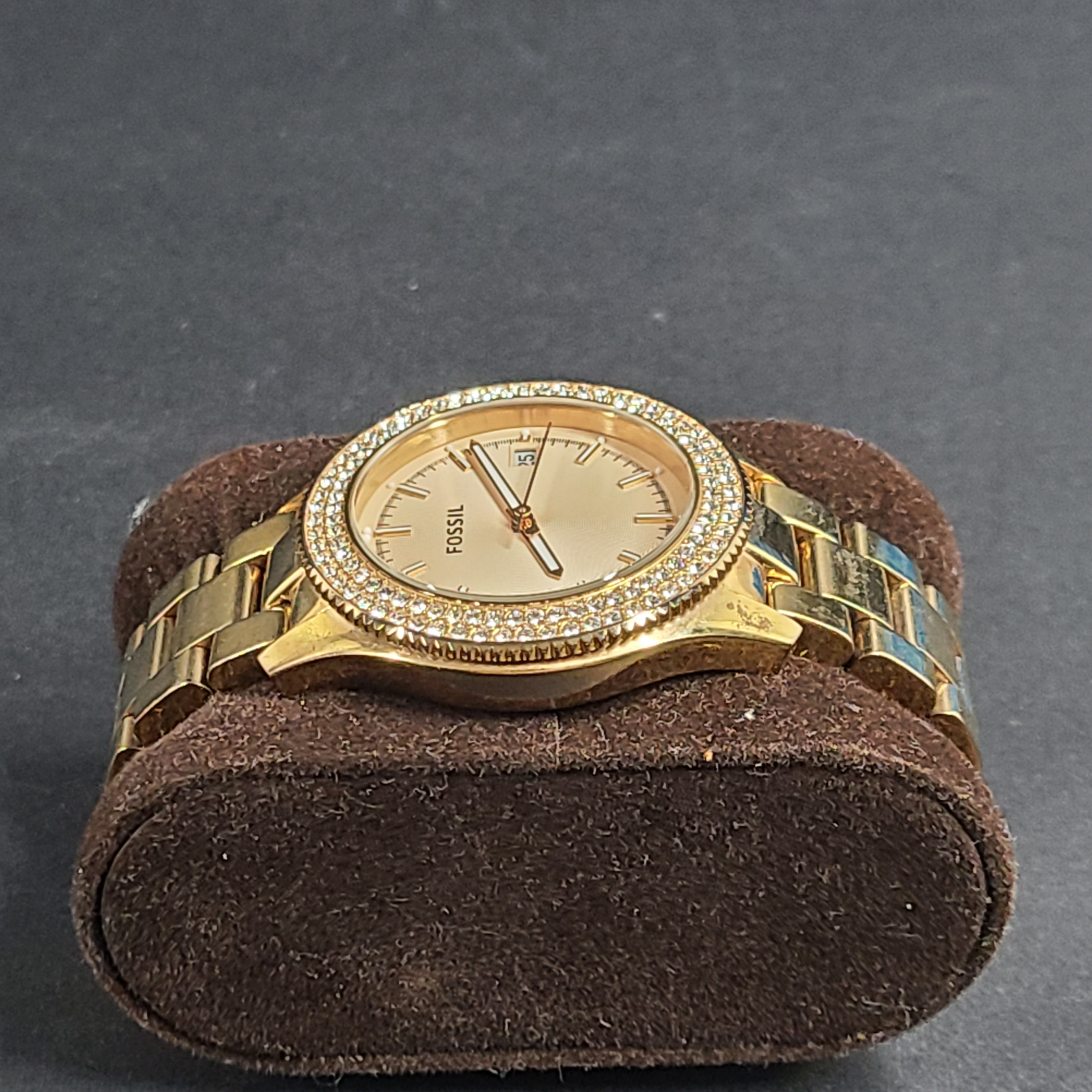 A stylish Fossil Analog Women's Watch with gold tones and crystal accents