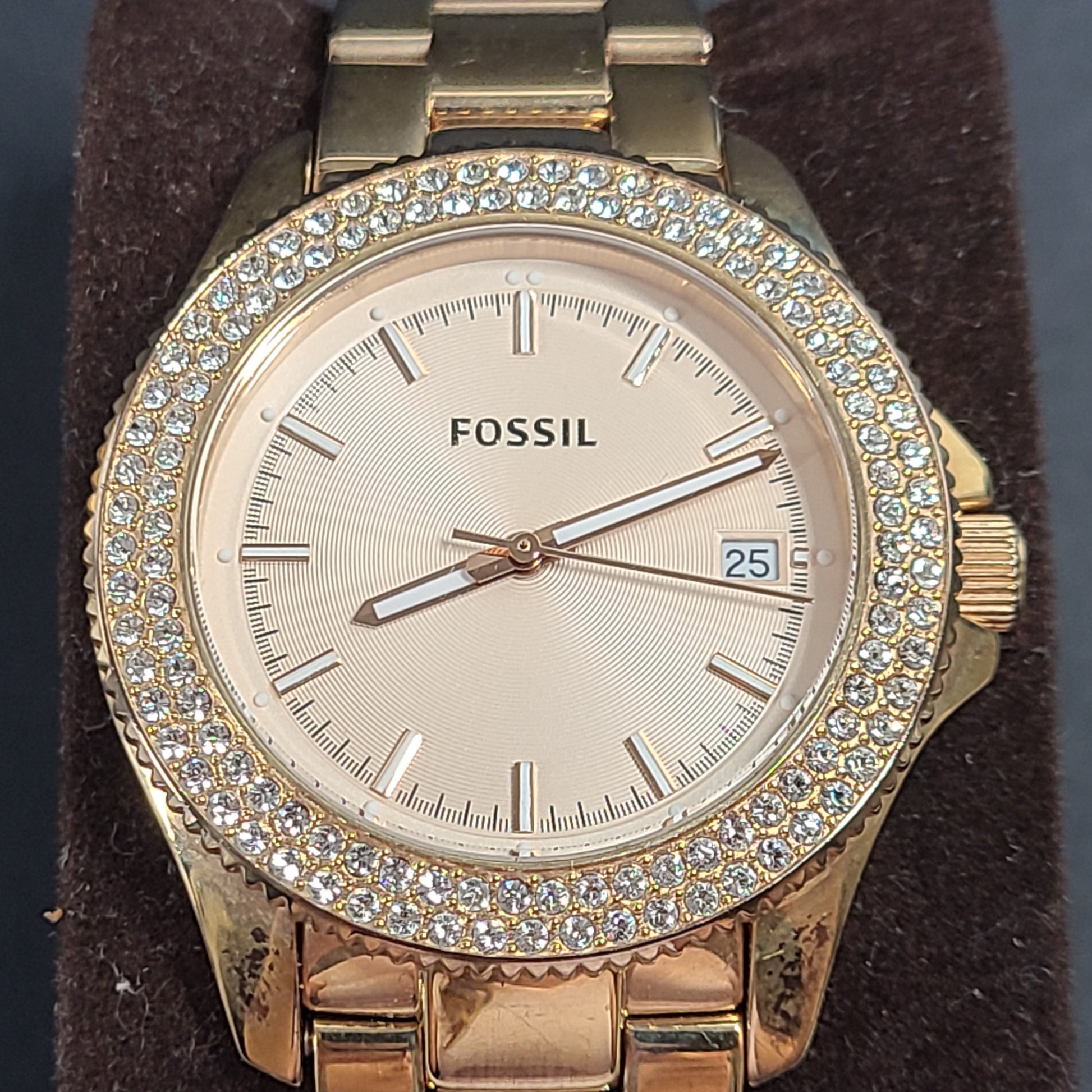 A stylish Fossil Analog Women's Watch with gold tones and crystal accents