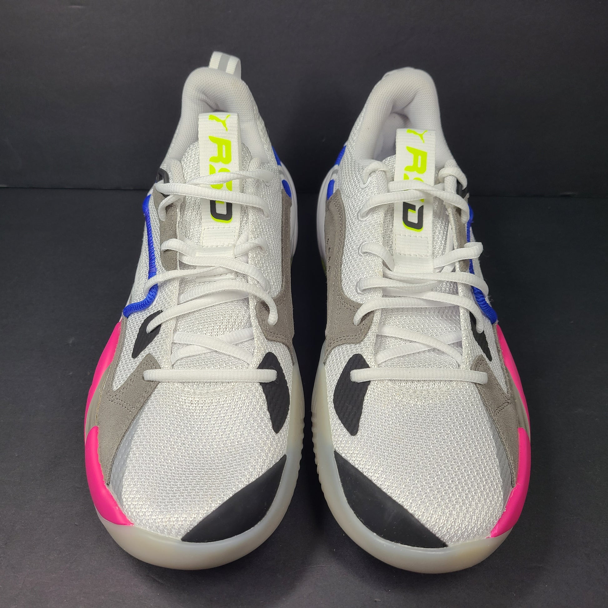A pair of white, gray, blue, and pink PUMA RS-Dreamer sneakers for men
