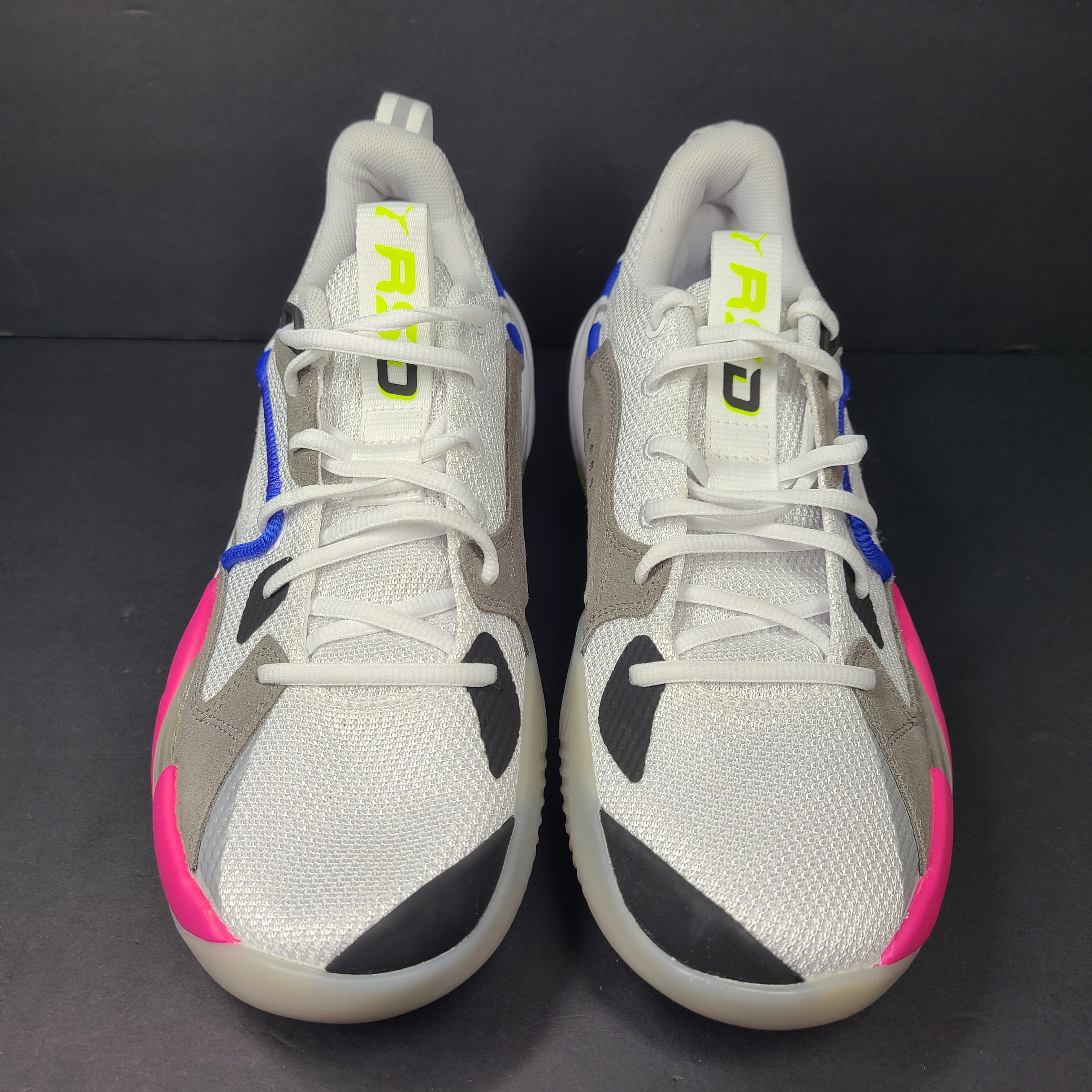 A pair of white, gray, blue, and pink PUMA RS-Dreamer sneakers for men