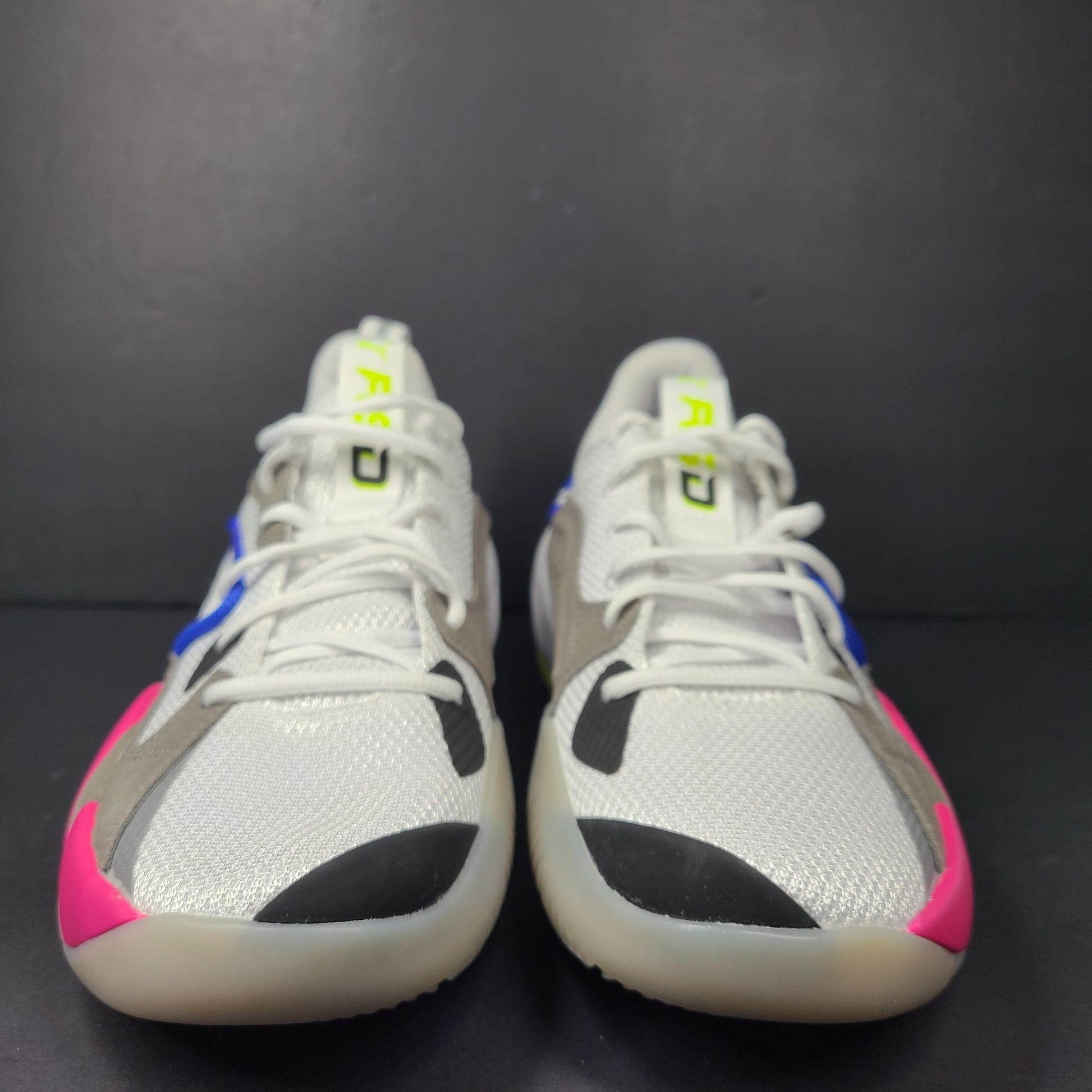 A pair of white, gray, blue, and pink PUMA RS-Dreamer sneakers for men