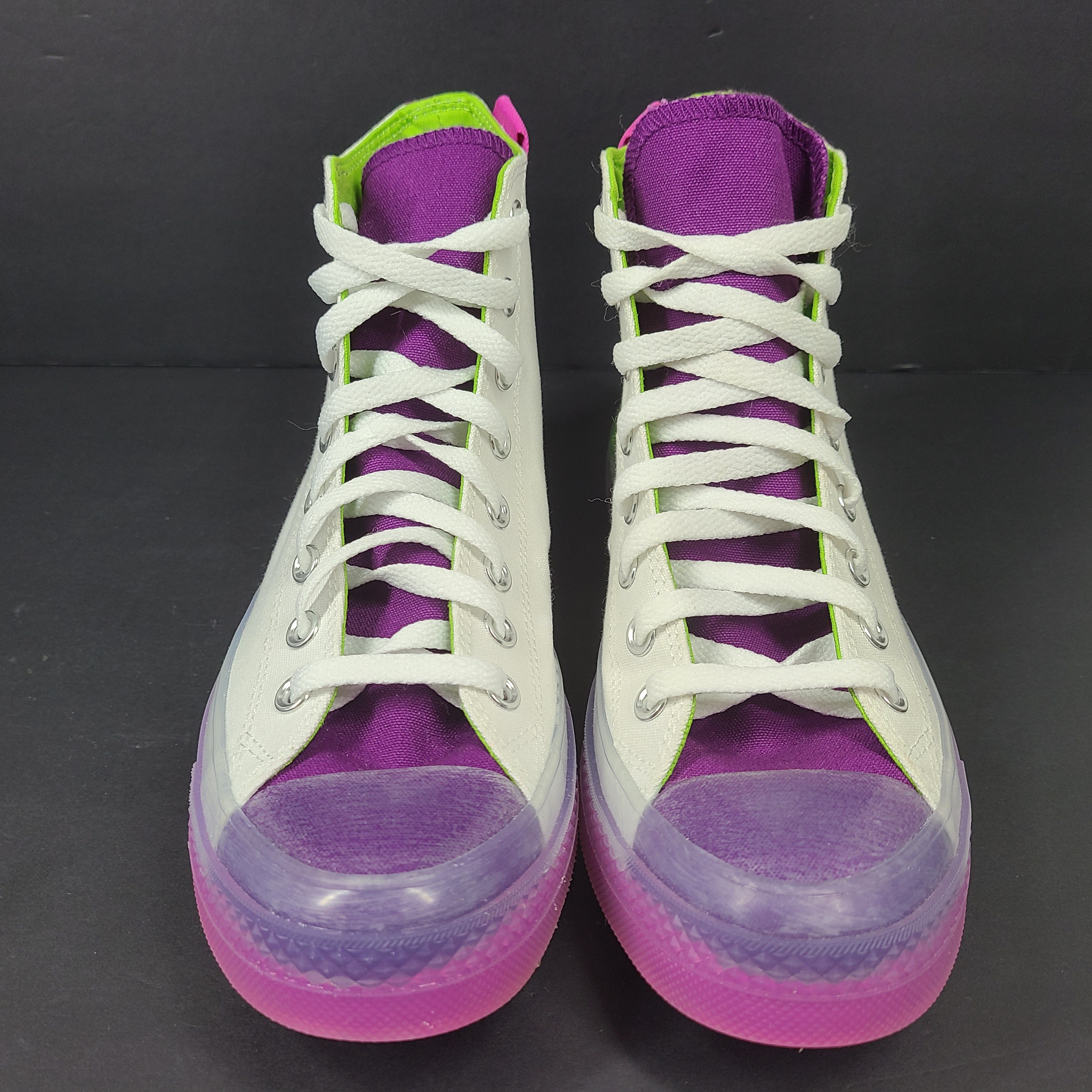 Classic Converse Chuck Taylor All Star high top sneakers in vibrant multicolor design.