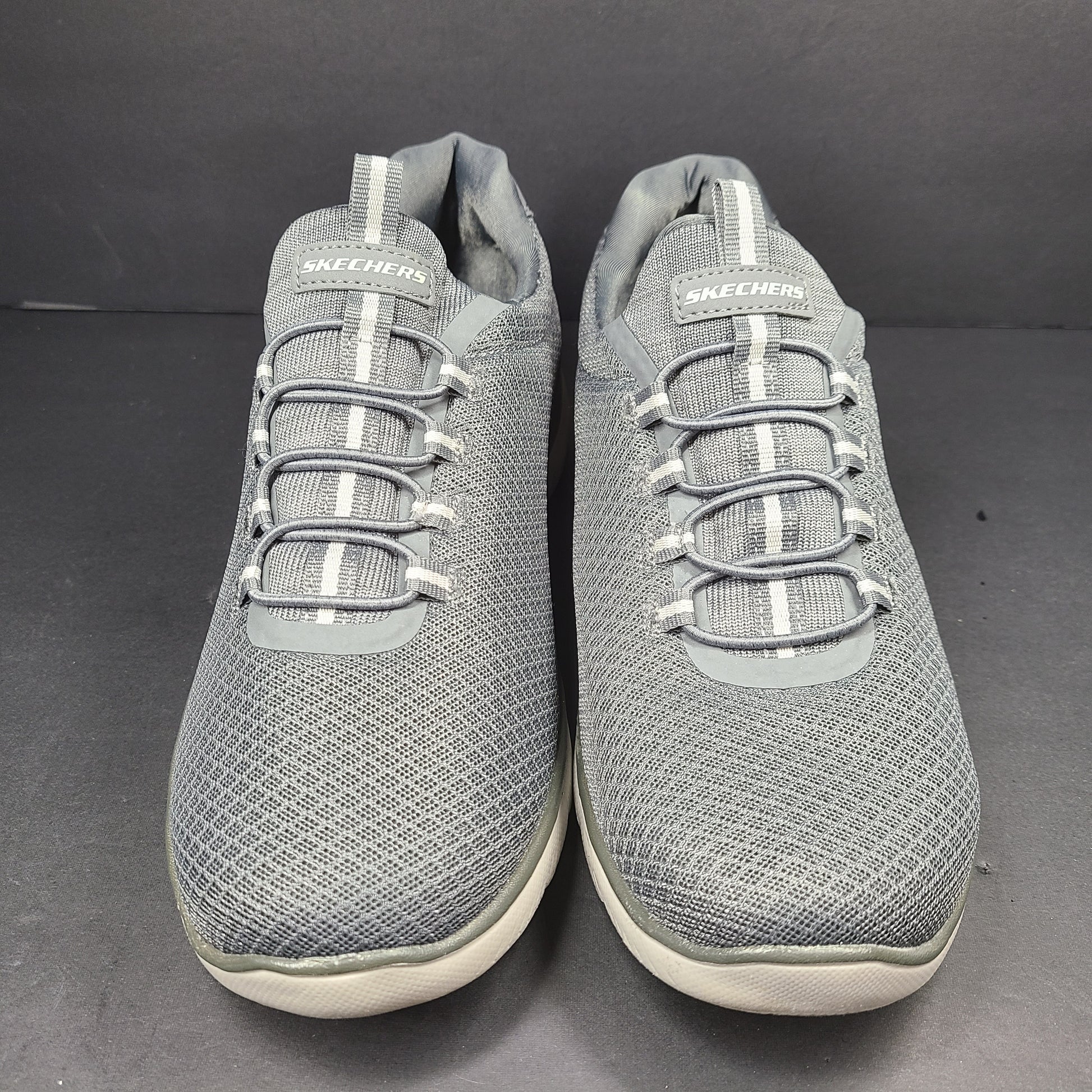 A pair of men's Skechers Wide Fit Memory Foam Charcoal Sneakers