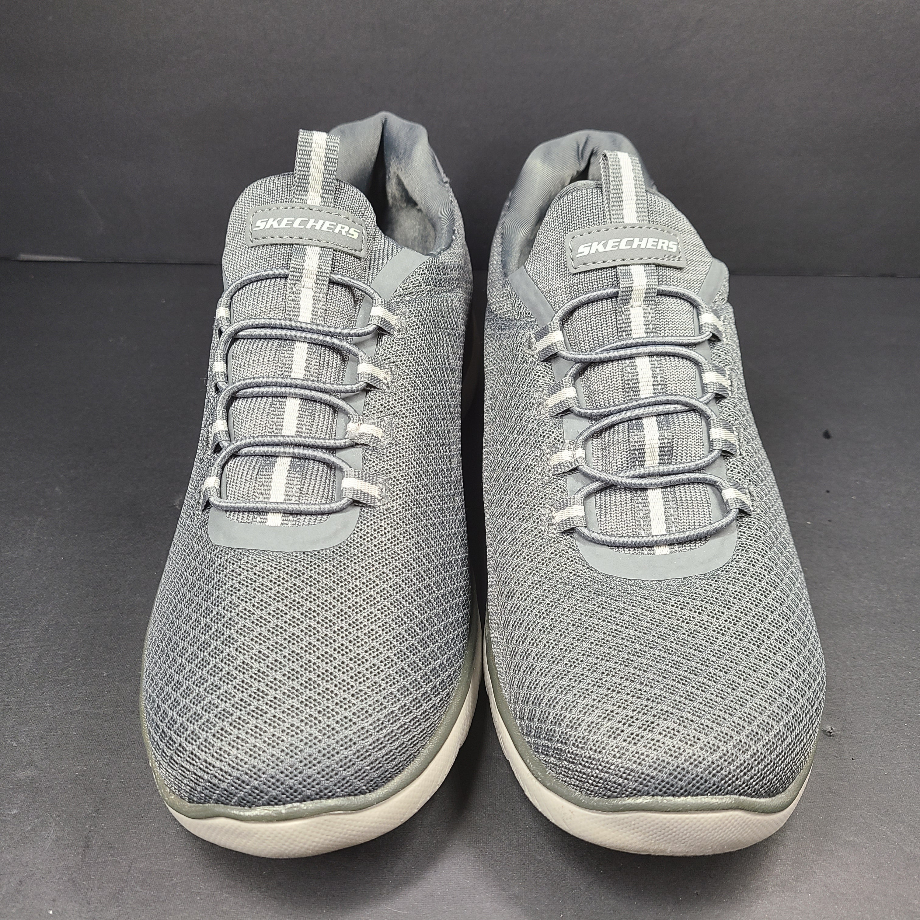 A pair of men's Skechers Wide Fit Memory Foam Charcoal Sneakers