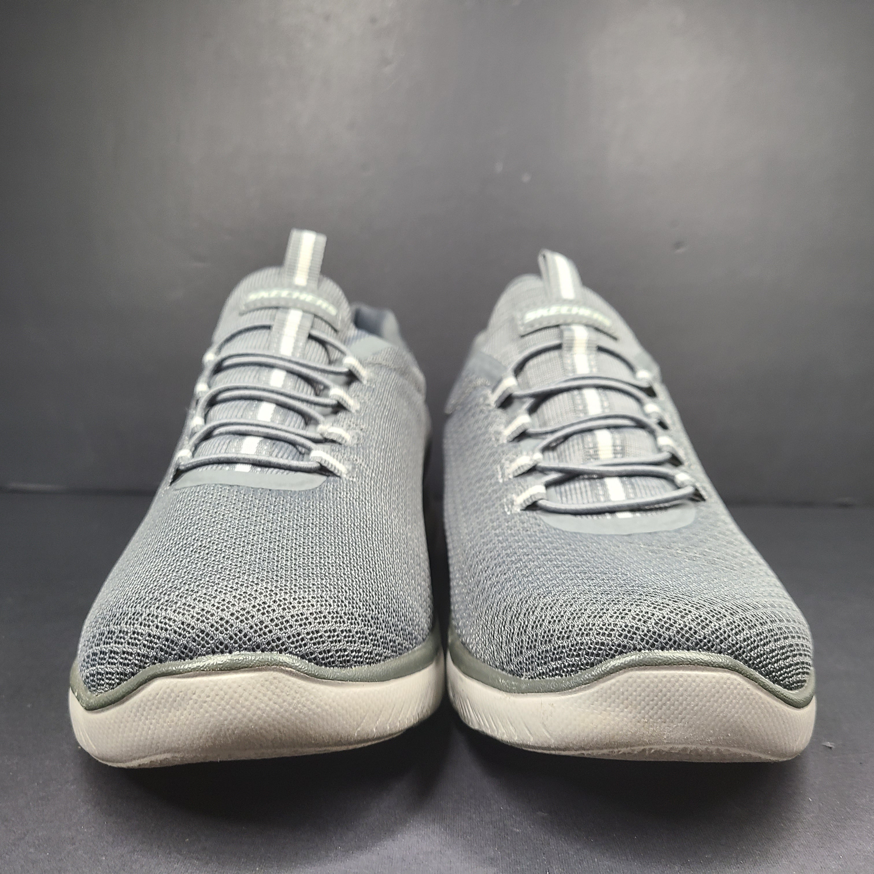 A pair of men's Skechers Wide Fit Memory Foam Charcoal Sneakers