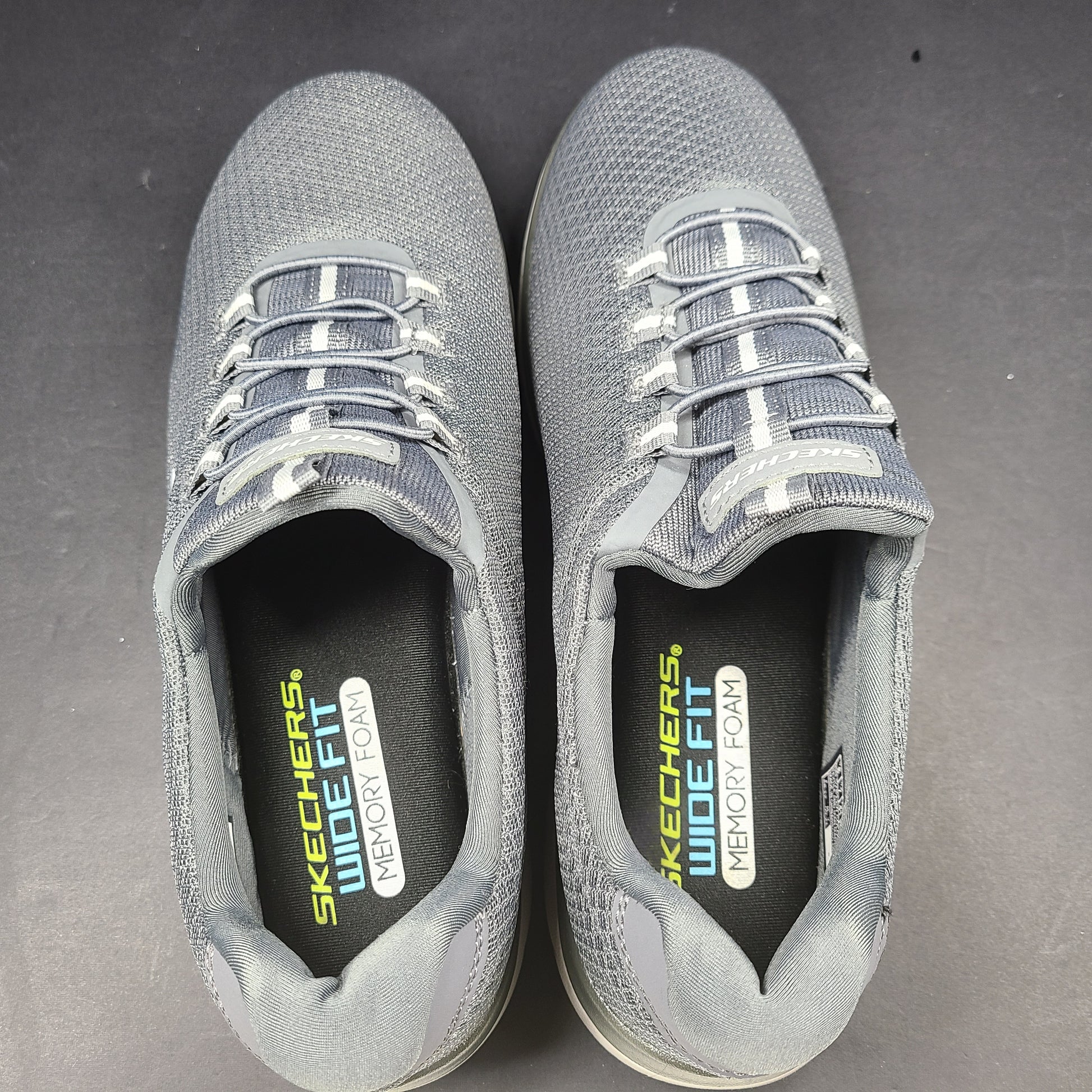 A pair of men's Skechers Wide Fit Memory Foam Charcoal Sneakers