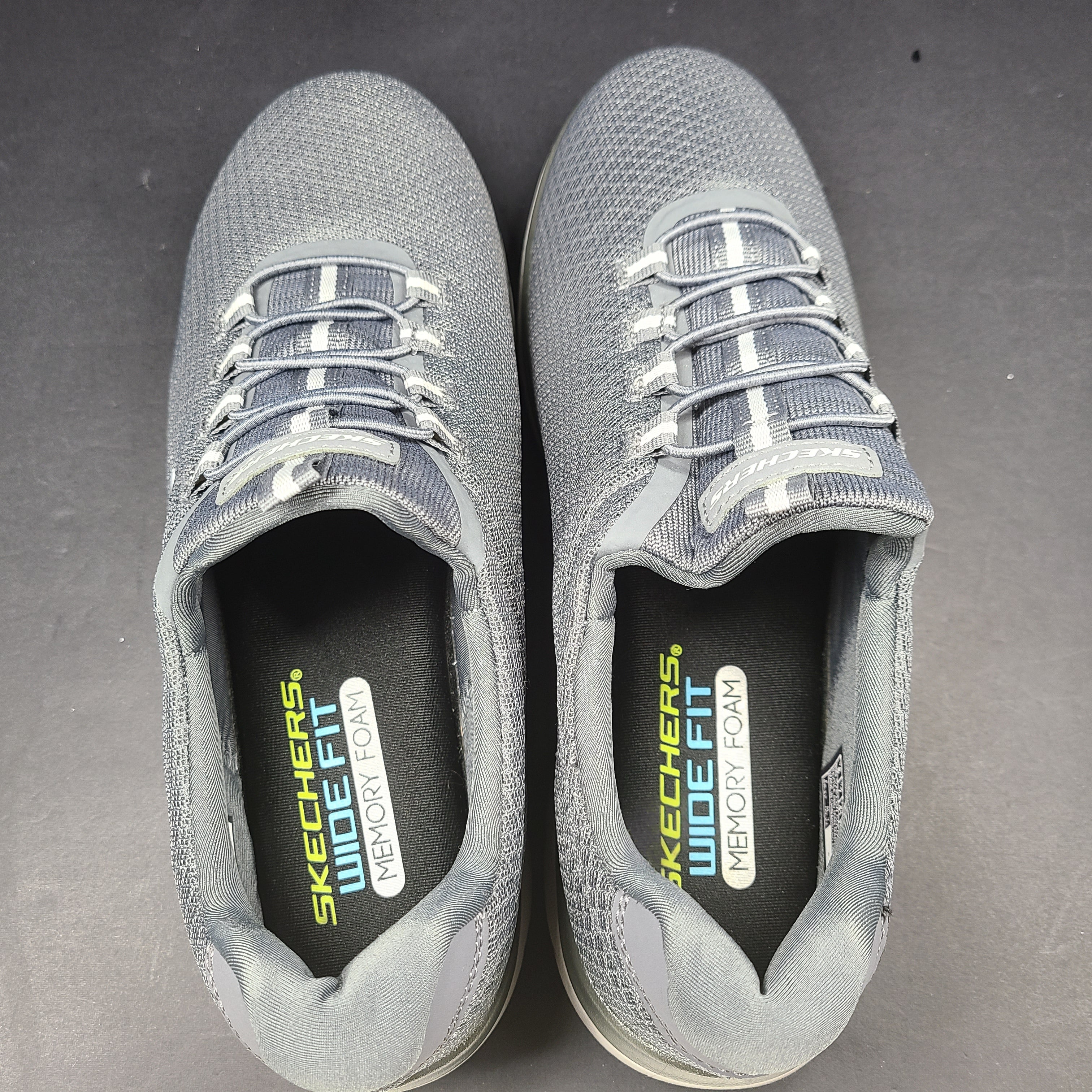 A pair of men's Skechers Wide Fit Memory Foam Charcoal Sneakers
