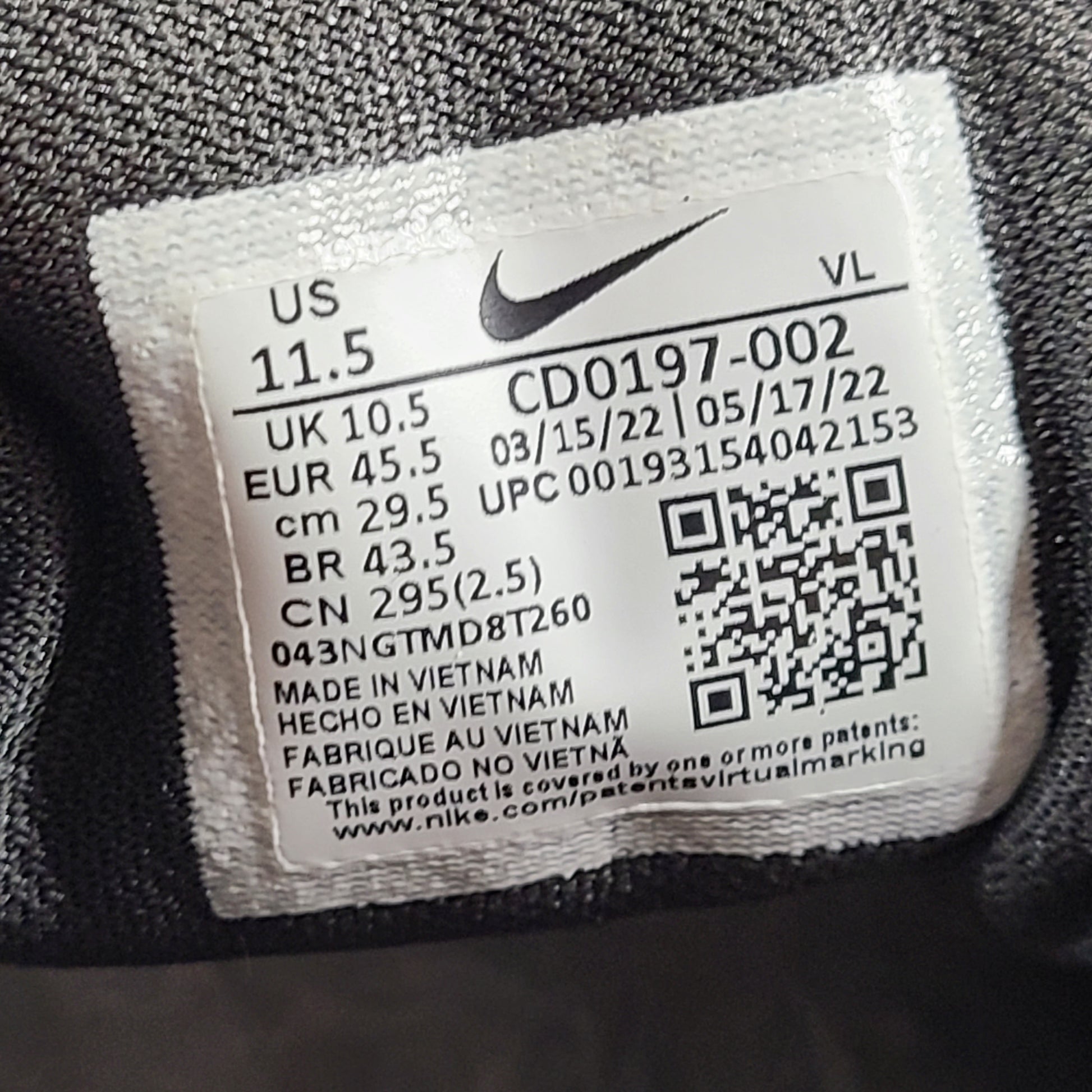 A pair of Nike Flex Training Shoes in Black and White