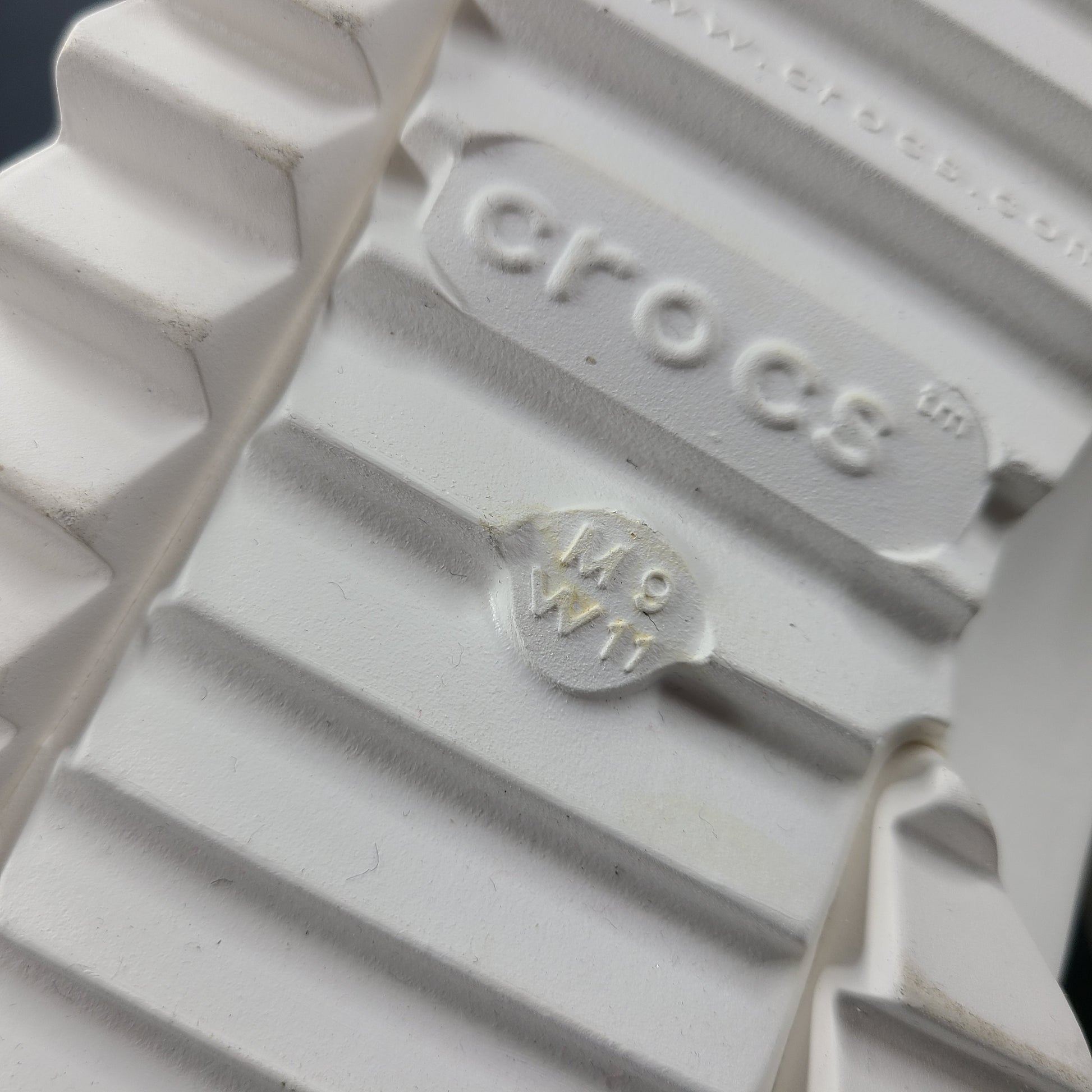 A pair of white Crocs Classic Platform Clogs