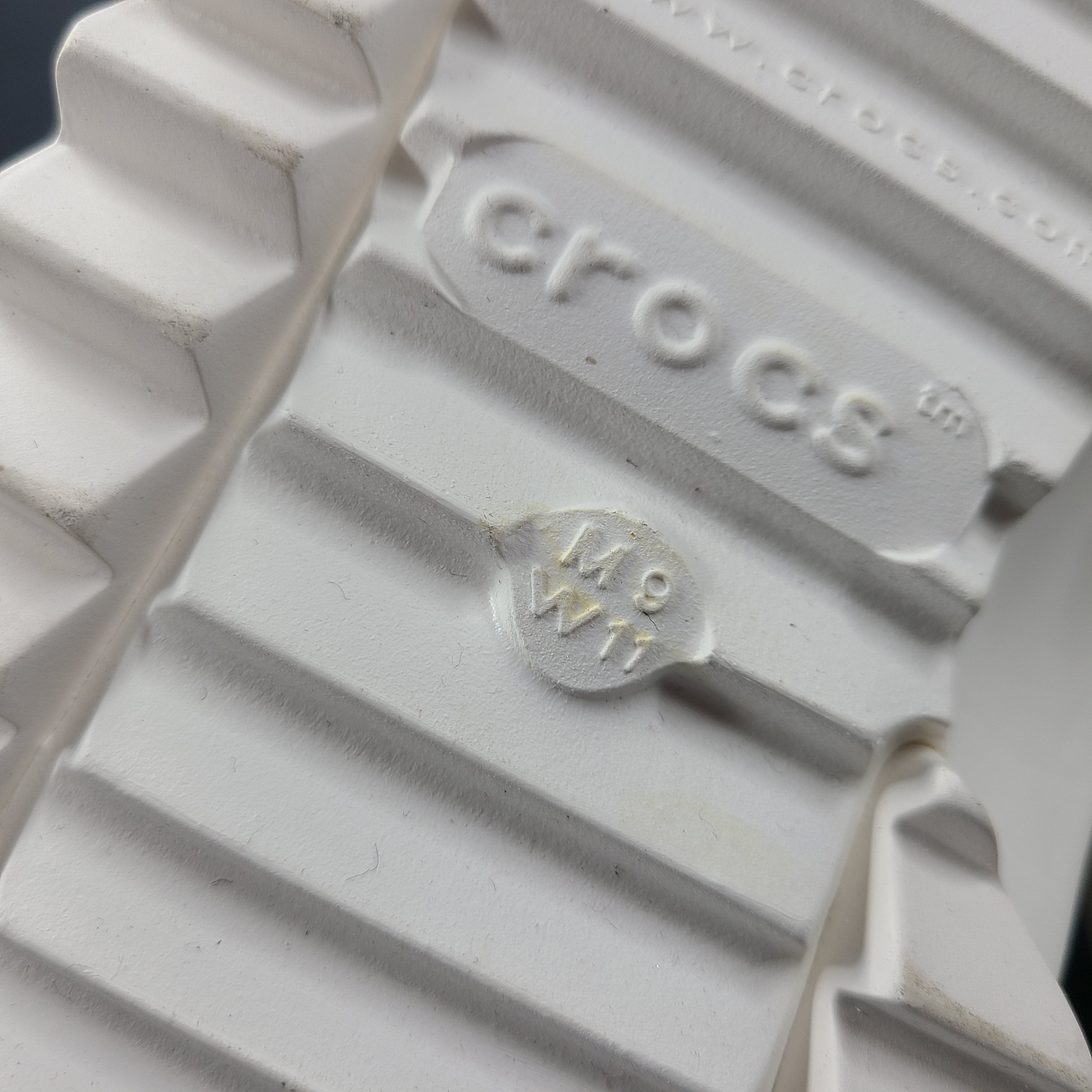 A pair of white Crocs Classic Platform Clogs