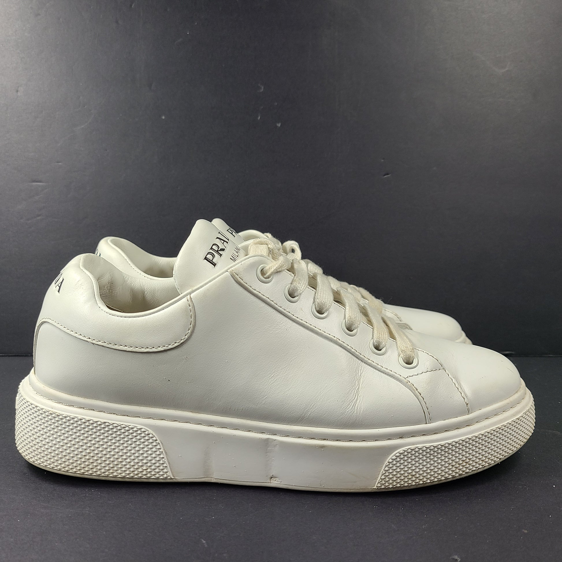 Stylish white Prada Milano leather sneakers in size 37.5