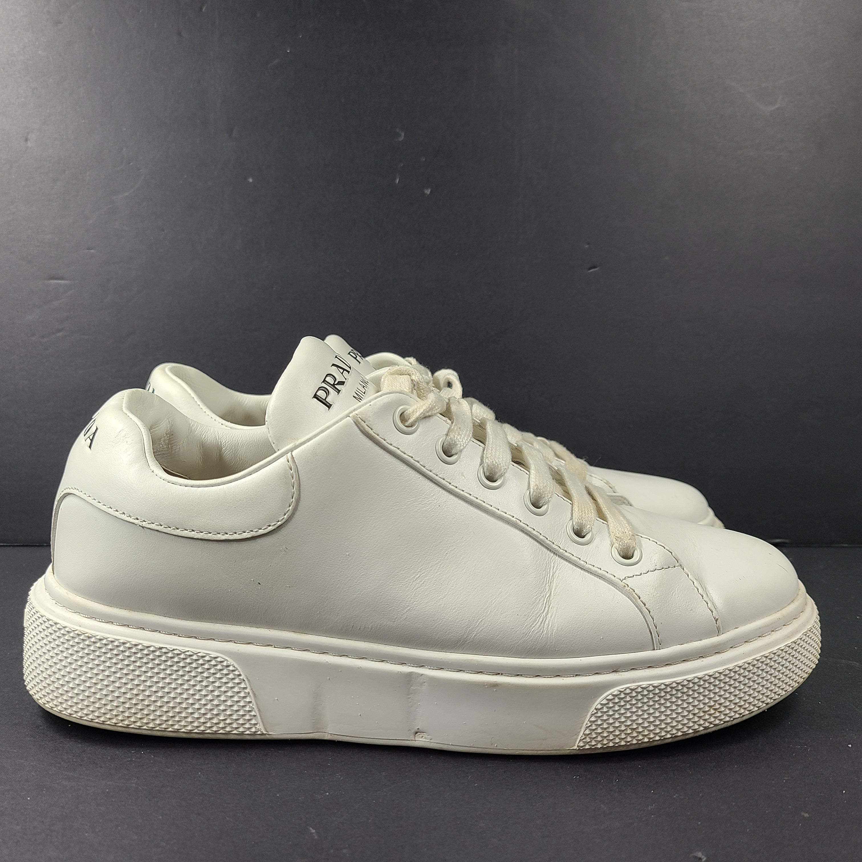 Stylish white Prada Milano leather sneakers in size 37.5