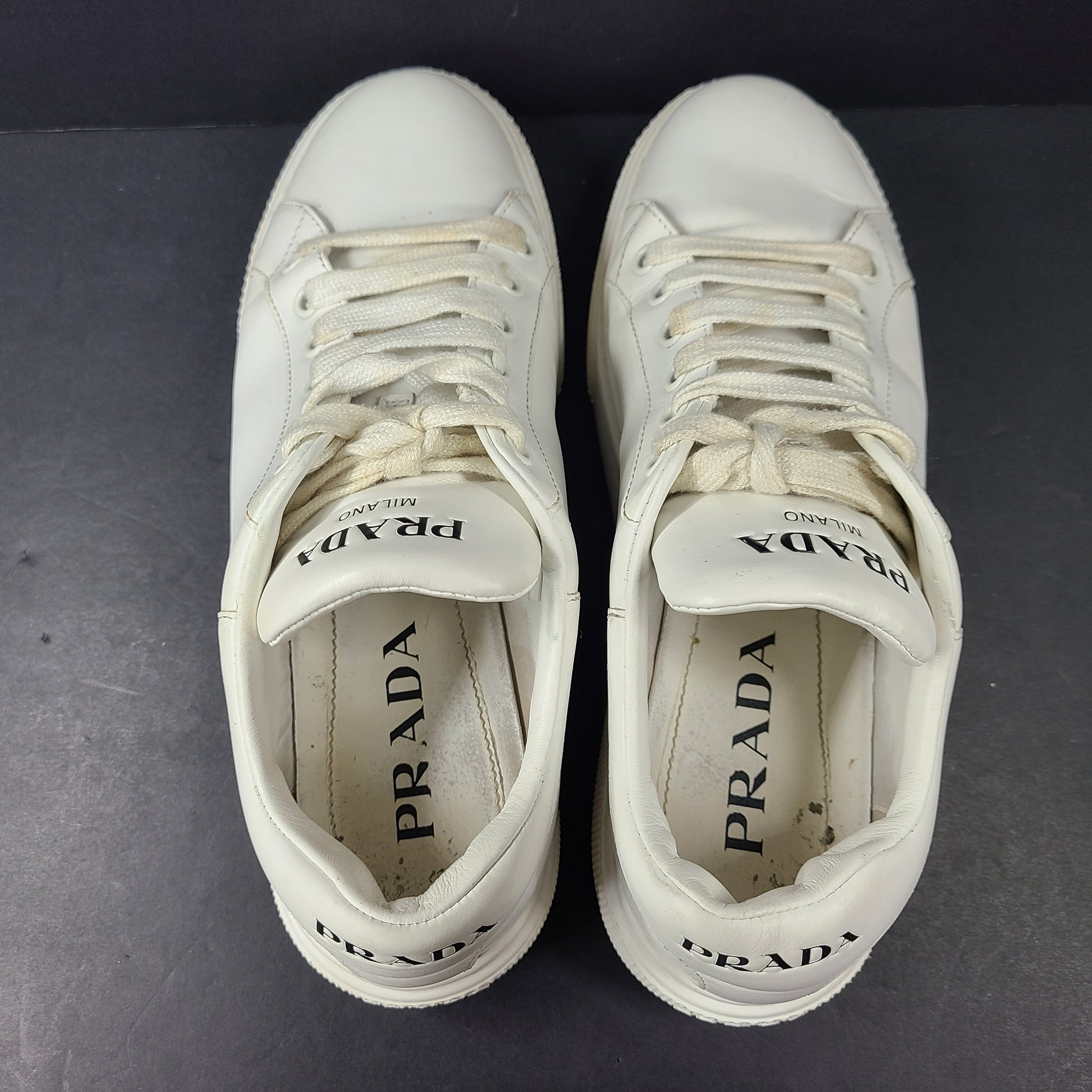 Stylish white Prada Milano leather sneakers in size 37.5