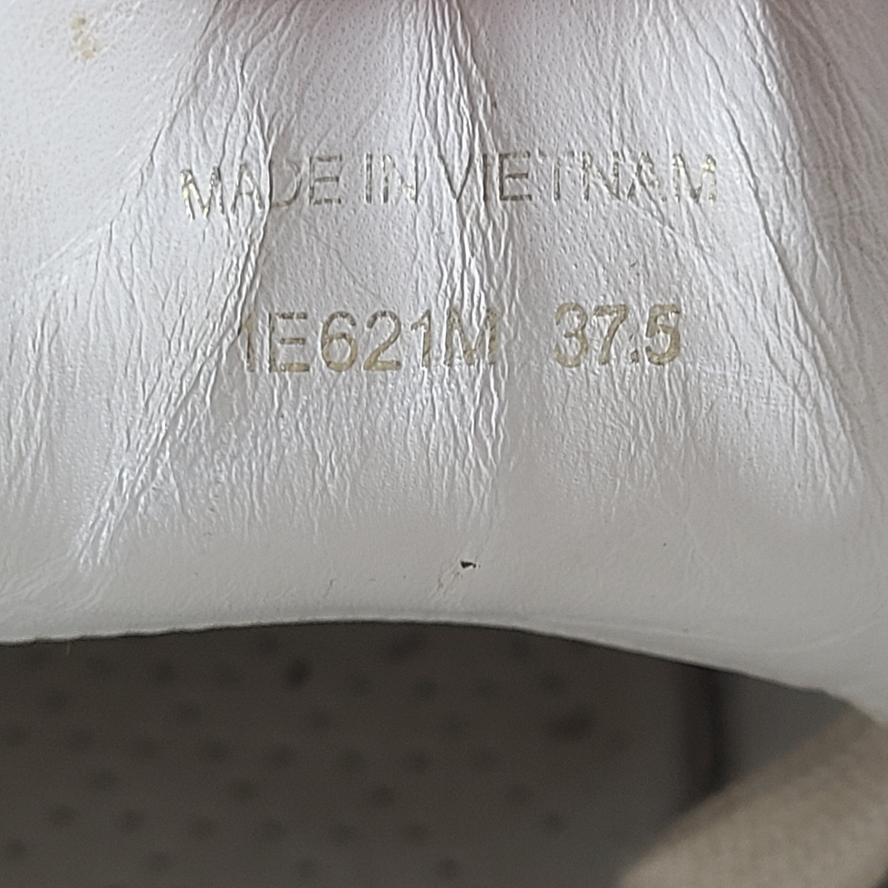 Stylish white Prada Milano leather sneakers in size 37.5