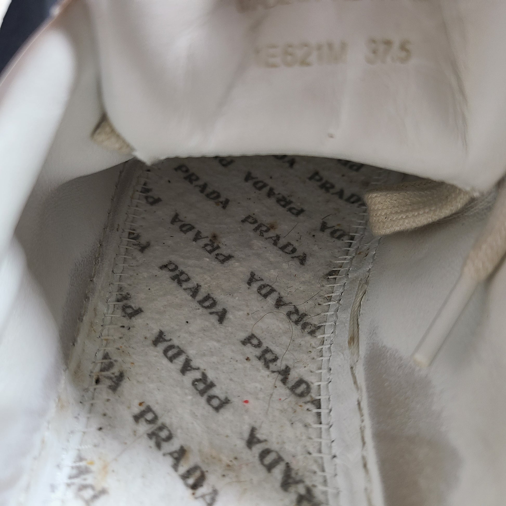 Stylish white Prada Milano leather sneakers in size 37.5