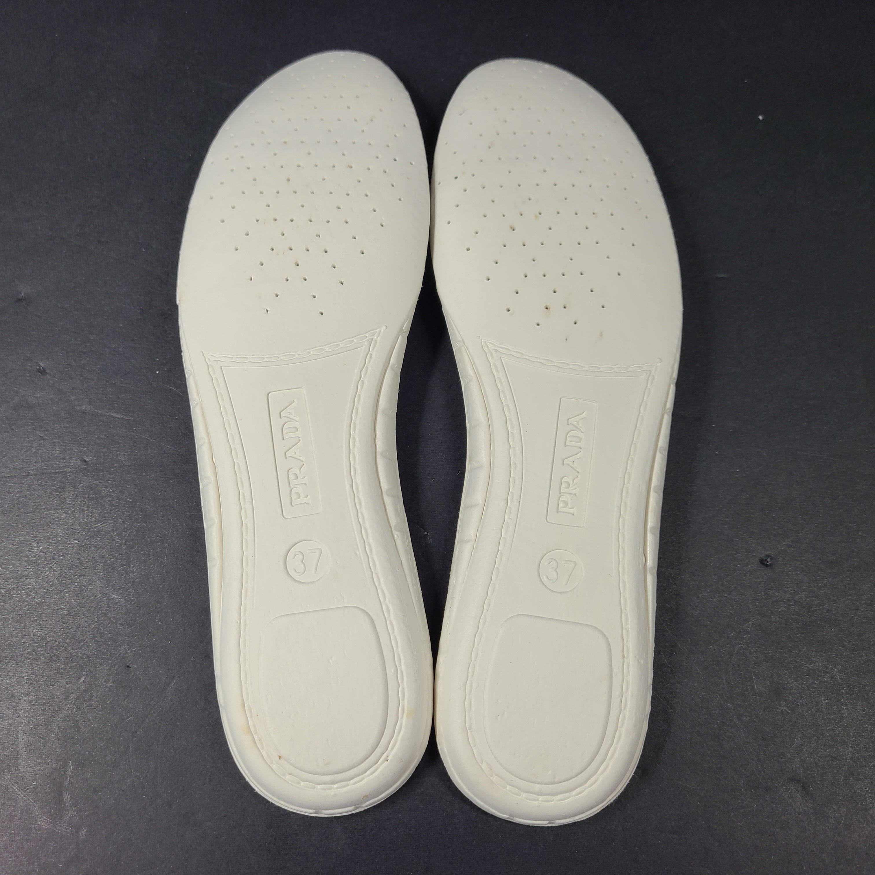 Stylish white Prada Milano leather sneakers in size 37.5