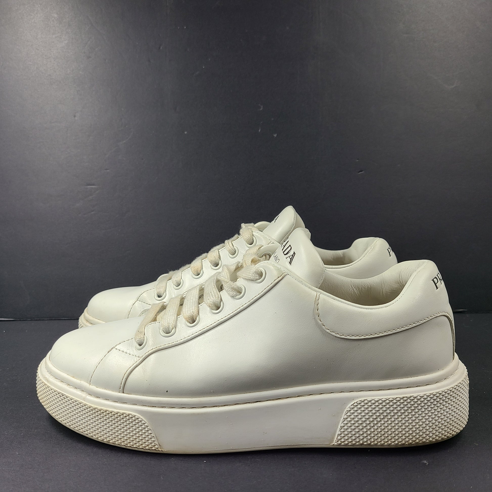 Stylish white Prada Milano leather sneakers in size 37.5