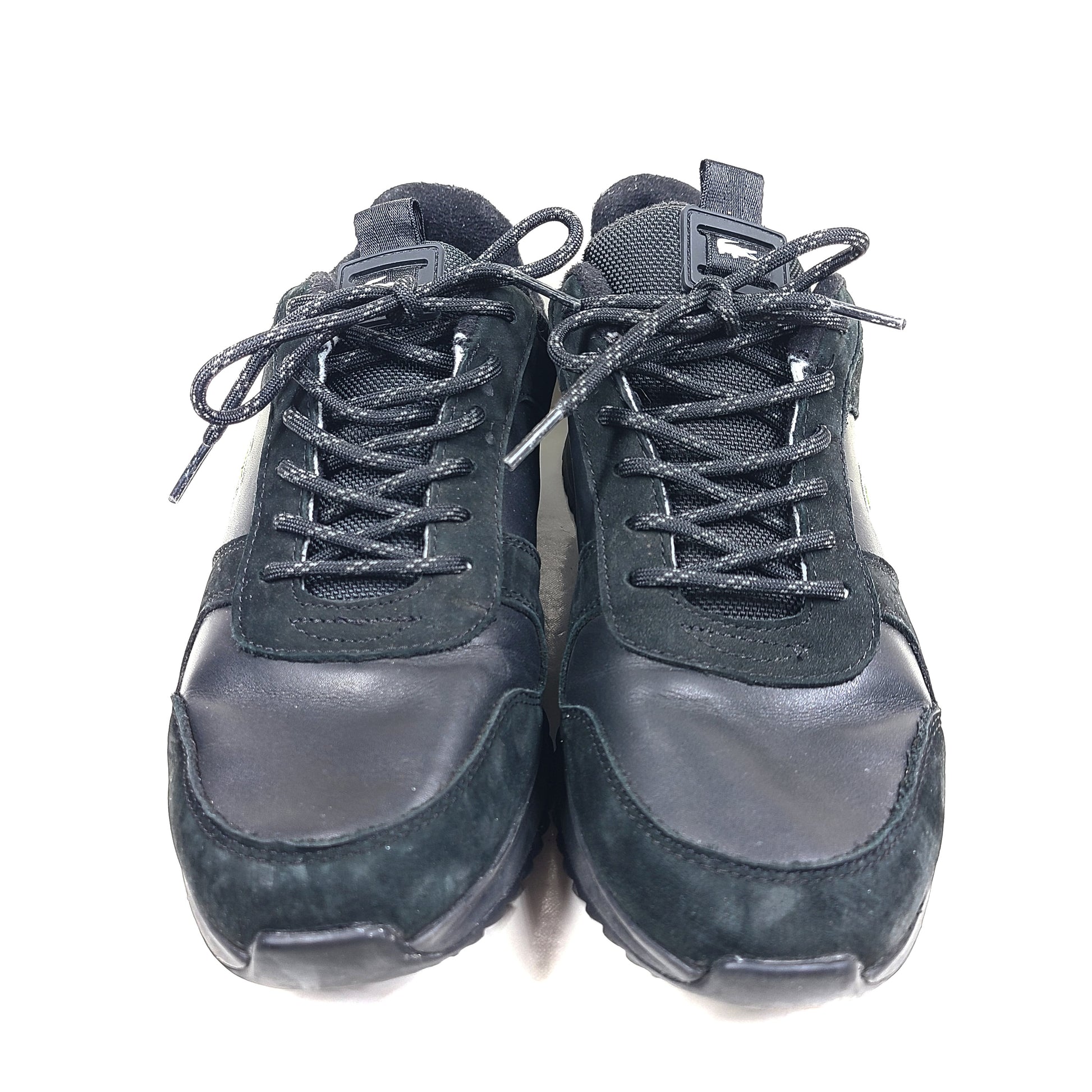 A pair of black Lacoste Joggeur 2.0 sneakers for men in size 10.