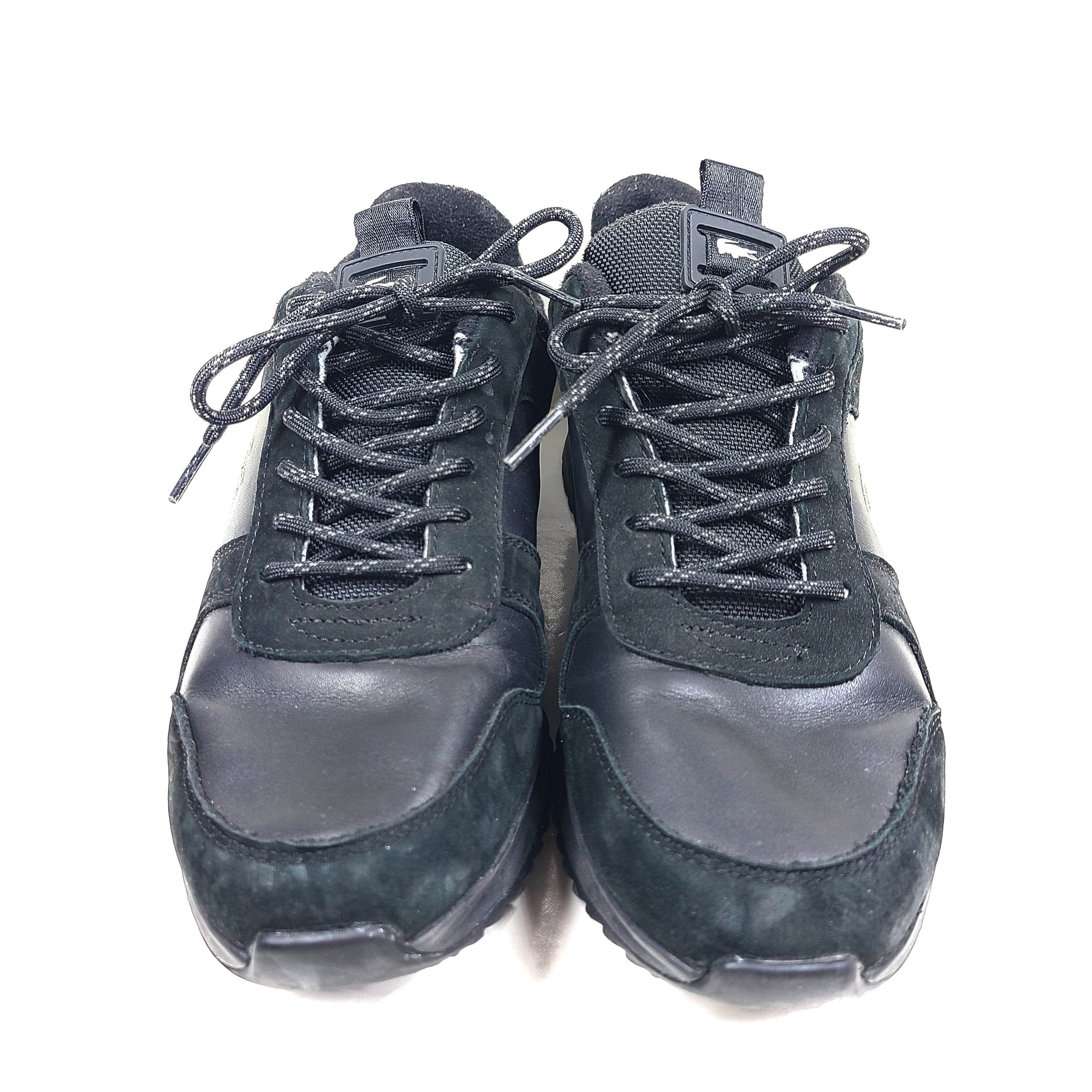 A pair of black Lacoste Joggeur 2.0 sneakers for men in size 10.