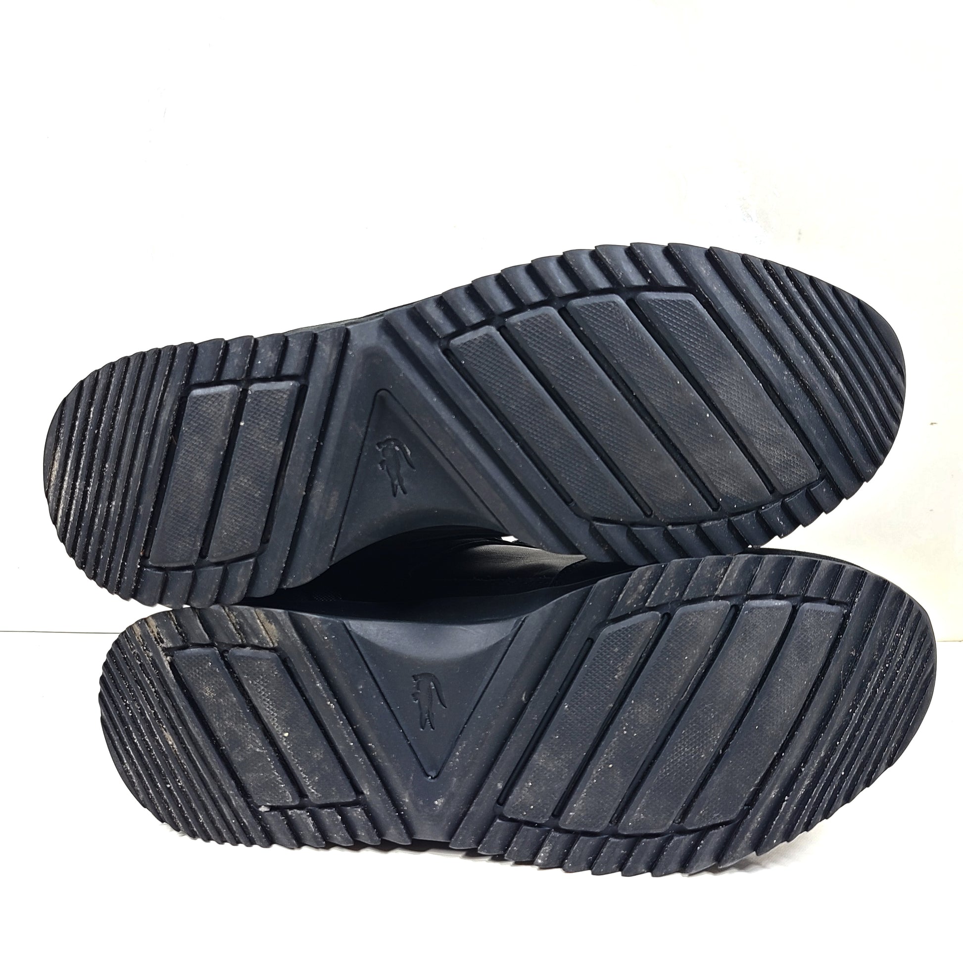 A pair of black Lacoste Joggeur 2.0 sneakers for men in size 10.