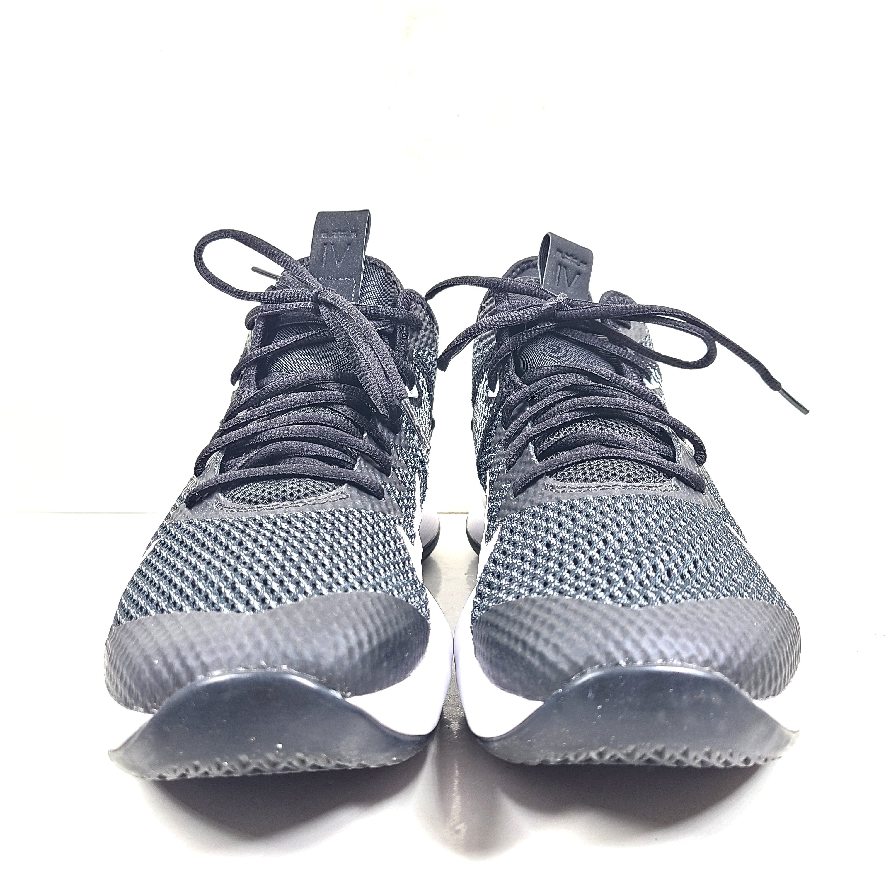 A pair of Nike LeBron 17 Basketball Shoes in Black and White color combination.