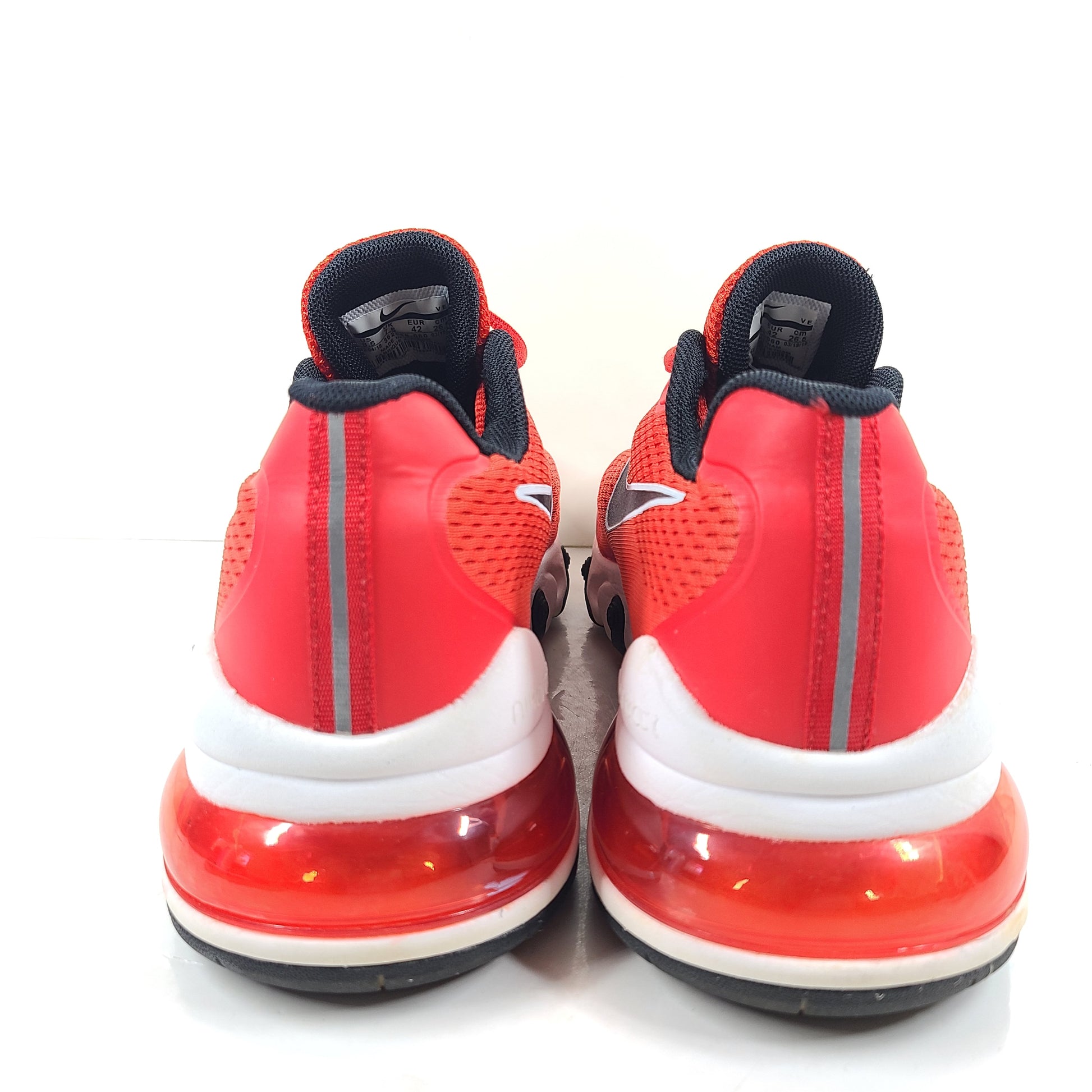 A pair of Nike React 270 red running shoes, size 8.5 EUR 42.