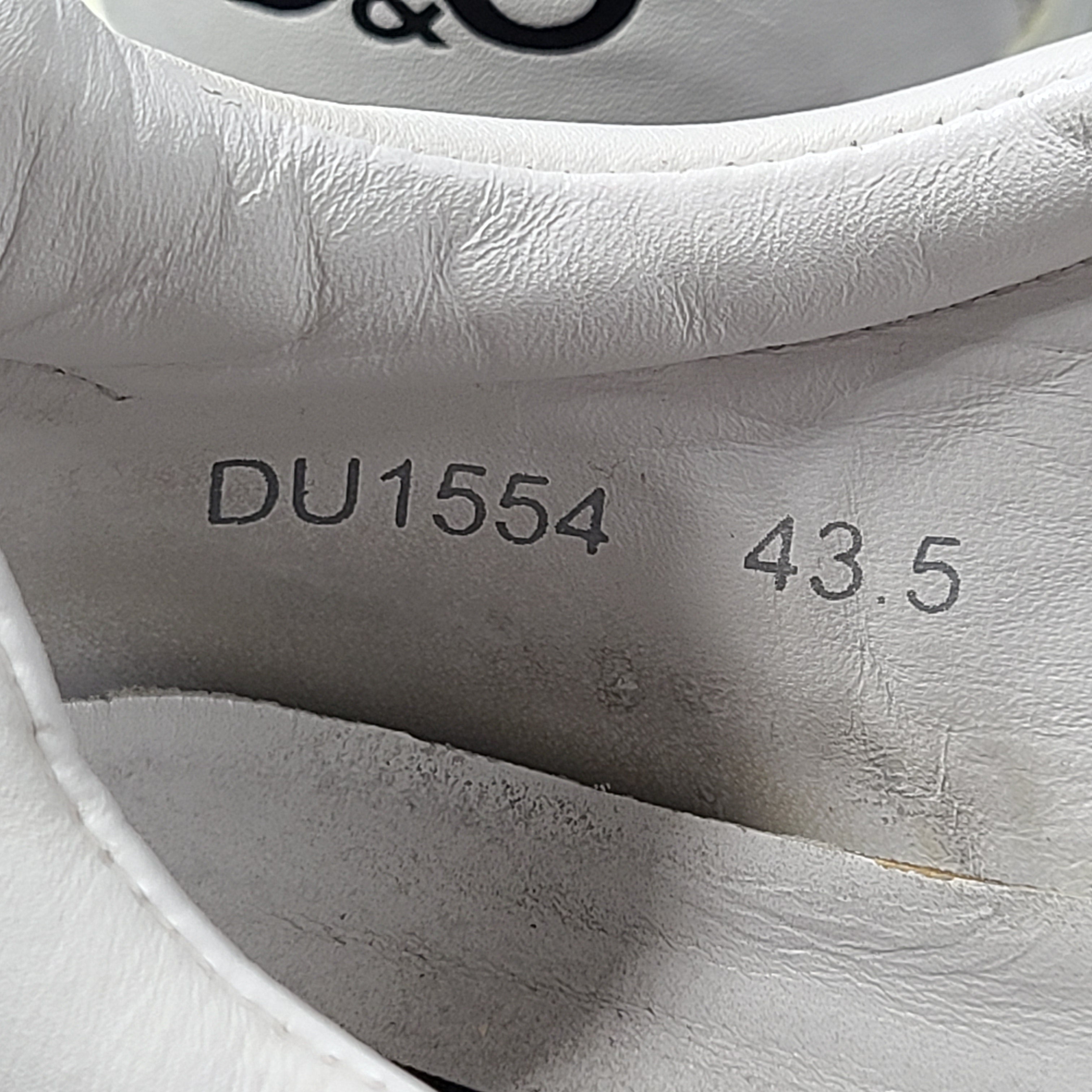 A pair of white D&G Dolce & Gabbana sneakers