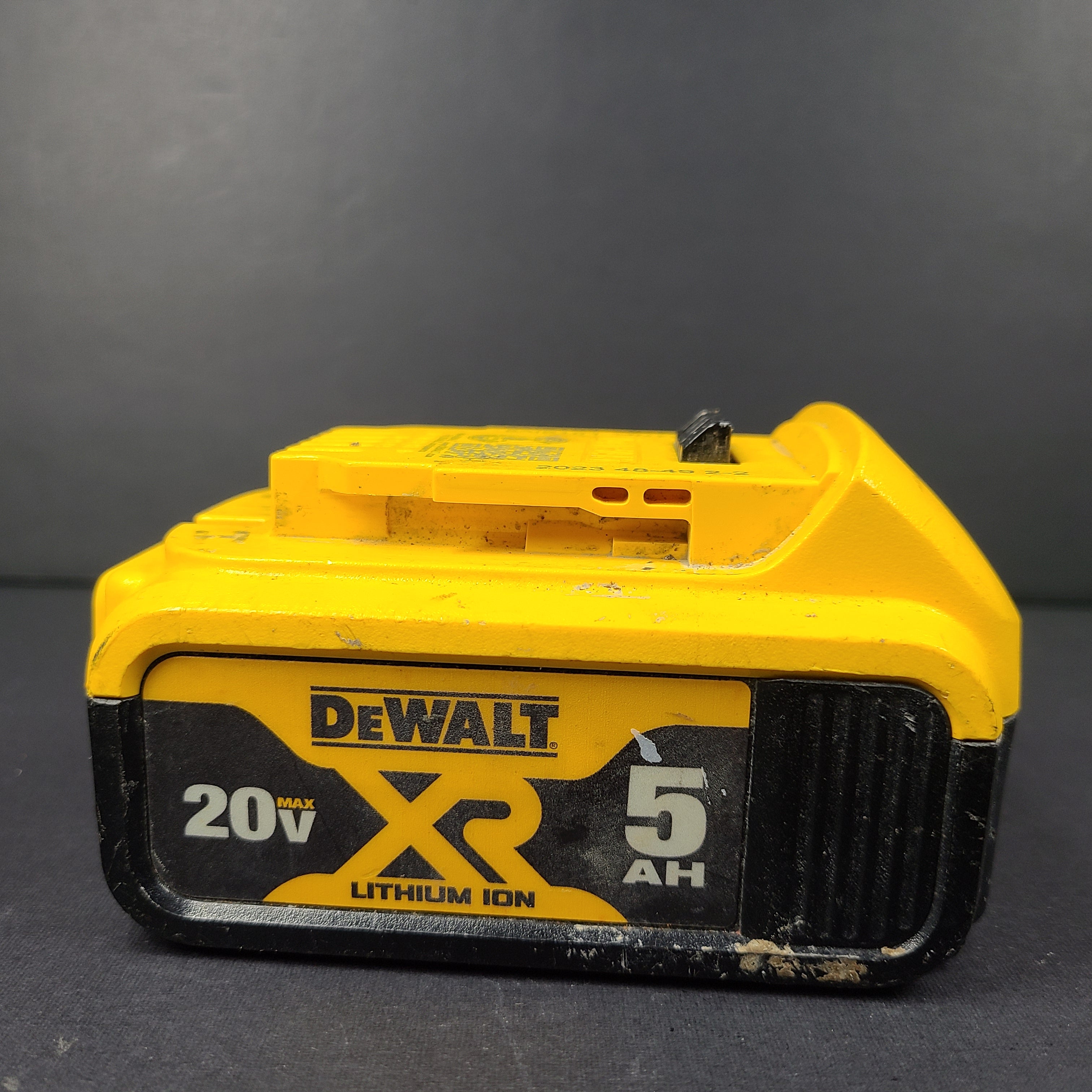 A durable DeWalt 20V Max XR Lithium Ion Battery Pack 5AH DCB205
