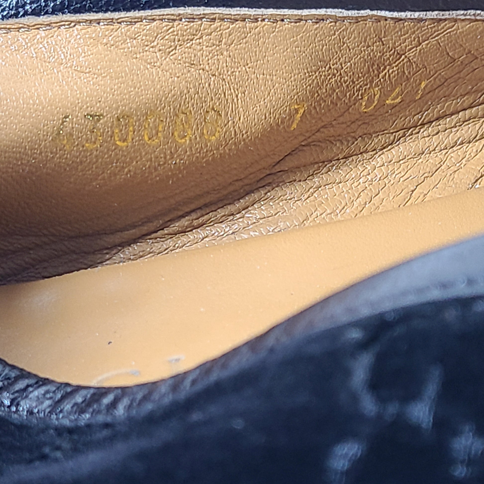 A pair of Gucci Men's Black Velvet Horsebit Loafers Size 7