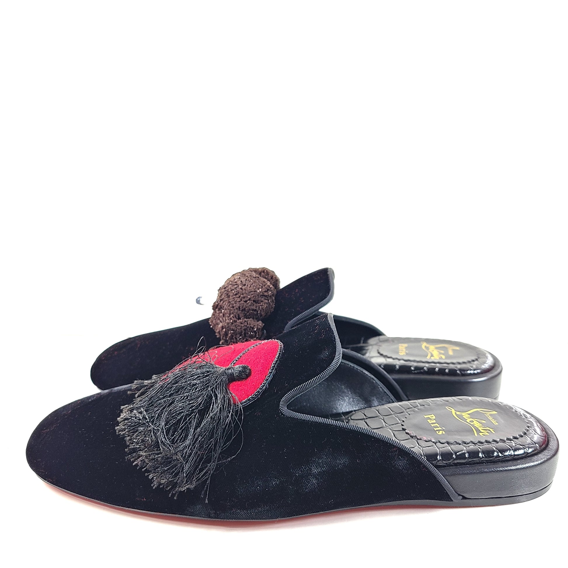 A pair of Christian Louboutin Black Velvet Tassel Slippers Size 41 for men