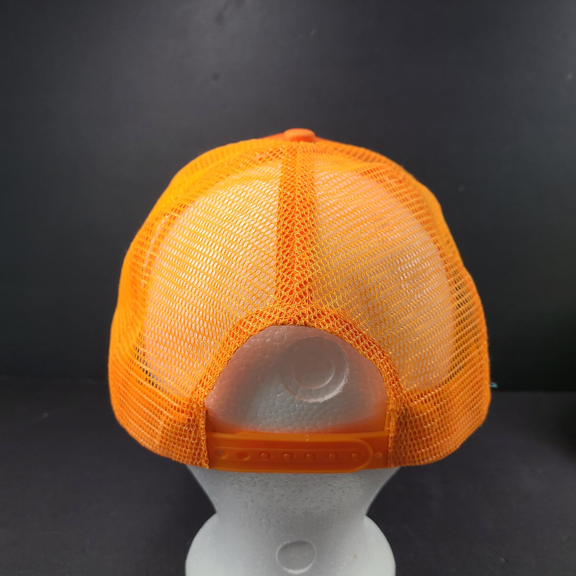 Scarface x Shoe Palace Miami orange trucker hat with mesh design and snapback closure