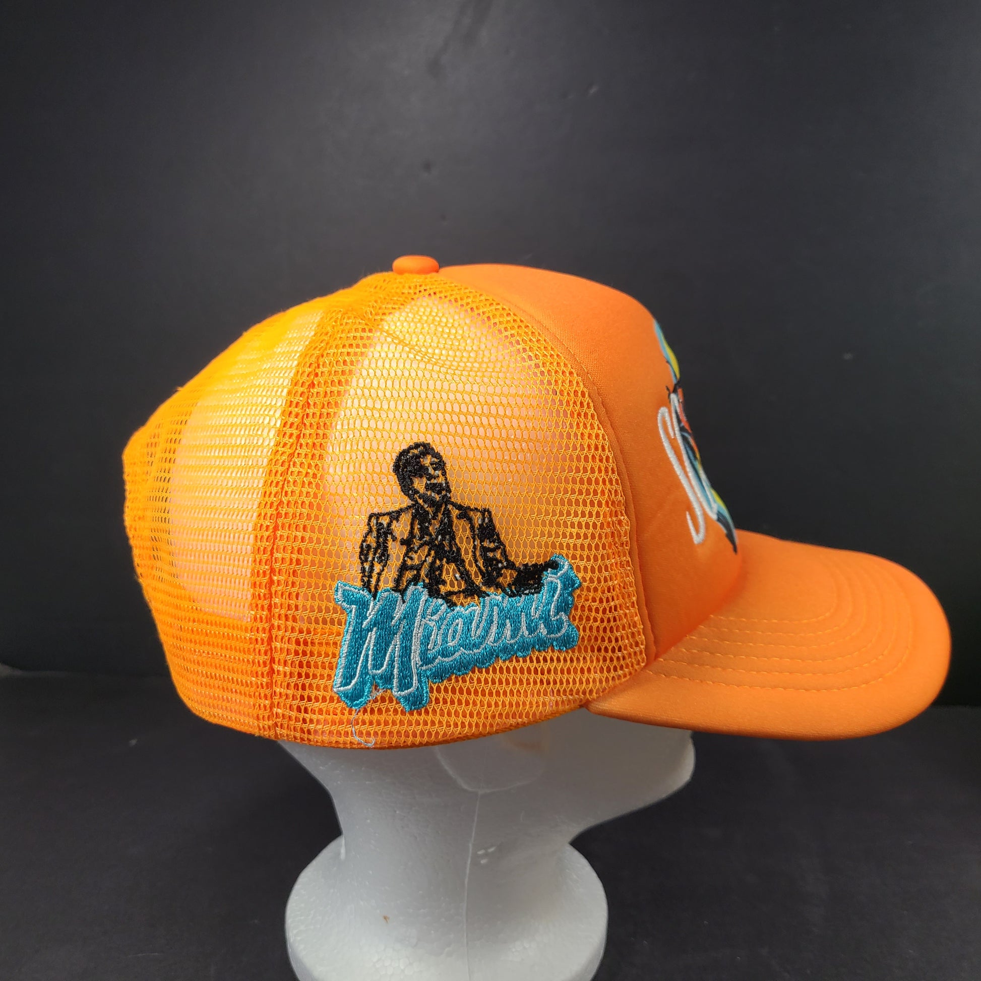 Scarface x Shoe Palace Miami orange trucker hat with mesh design and snapback closure