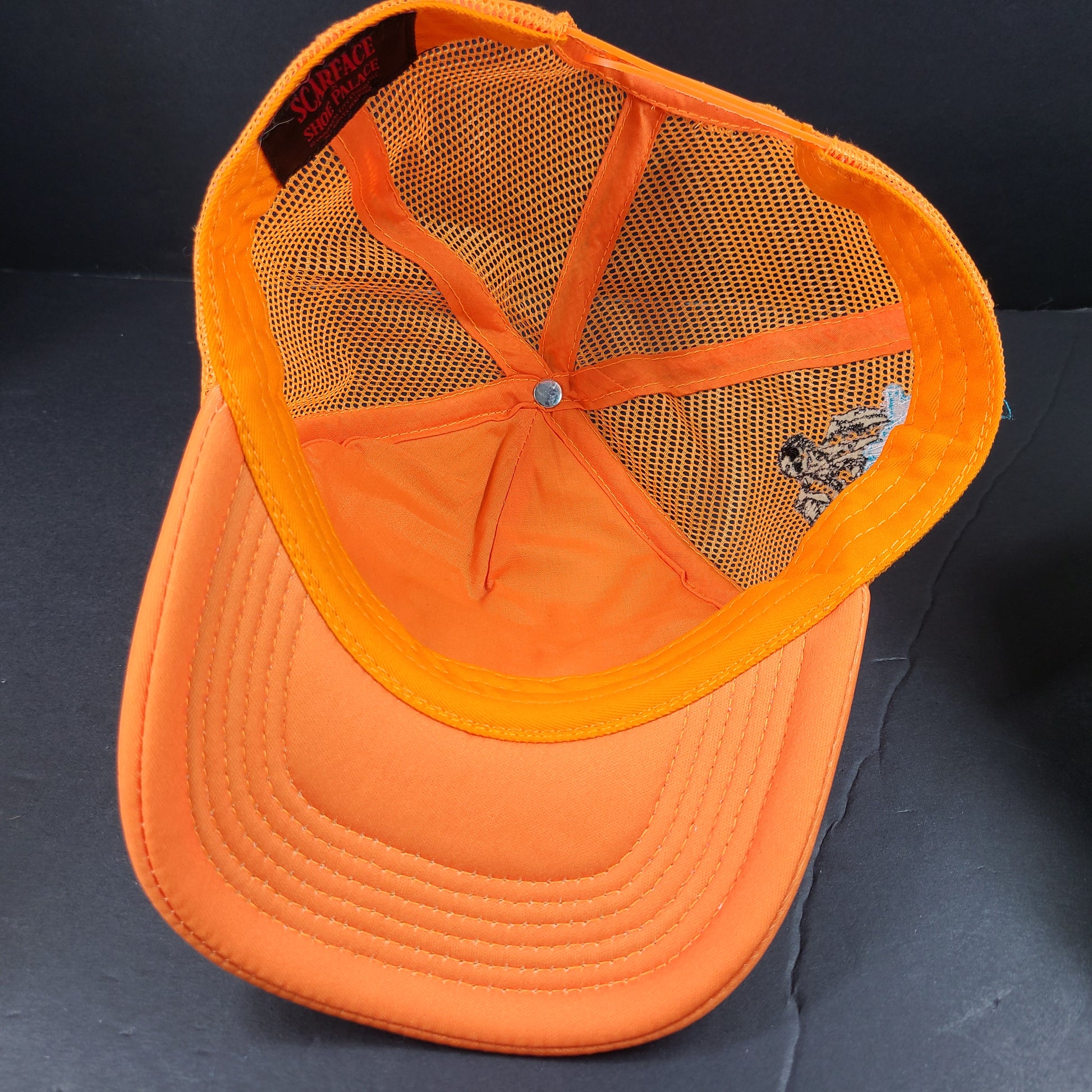 Scarface x Shoe Palace Miami orange trucker hat with mesh design and snapback closure