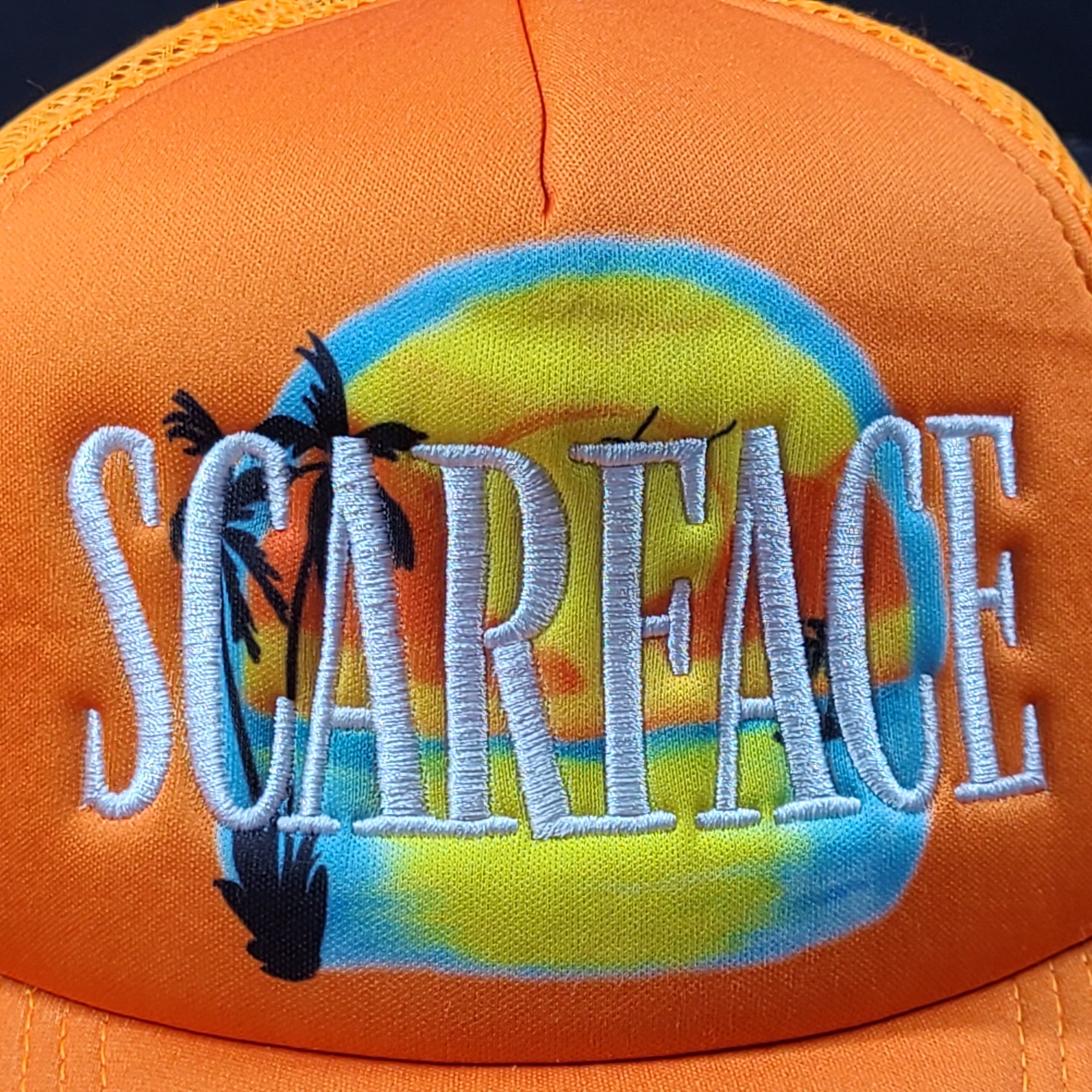 Scarface x Shoe Palace Miami orange trucker hat with mesh design and snapback closure