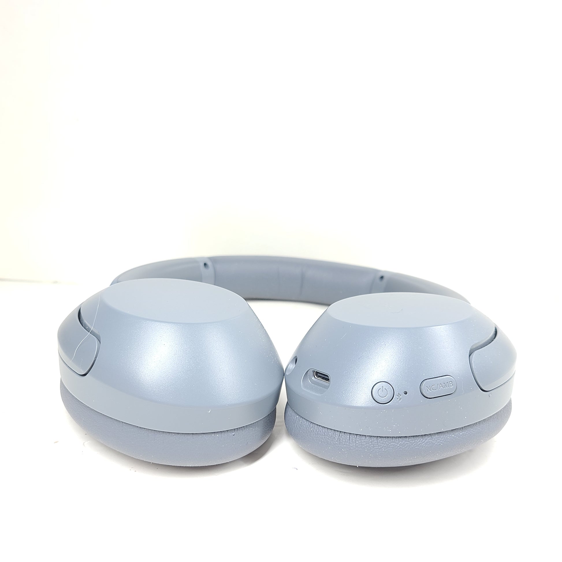 Over-ear Sony WH-CH710N headphones in gray with wireless noise-cancelling design and cushioned headband.